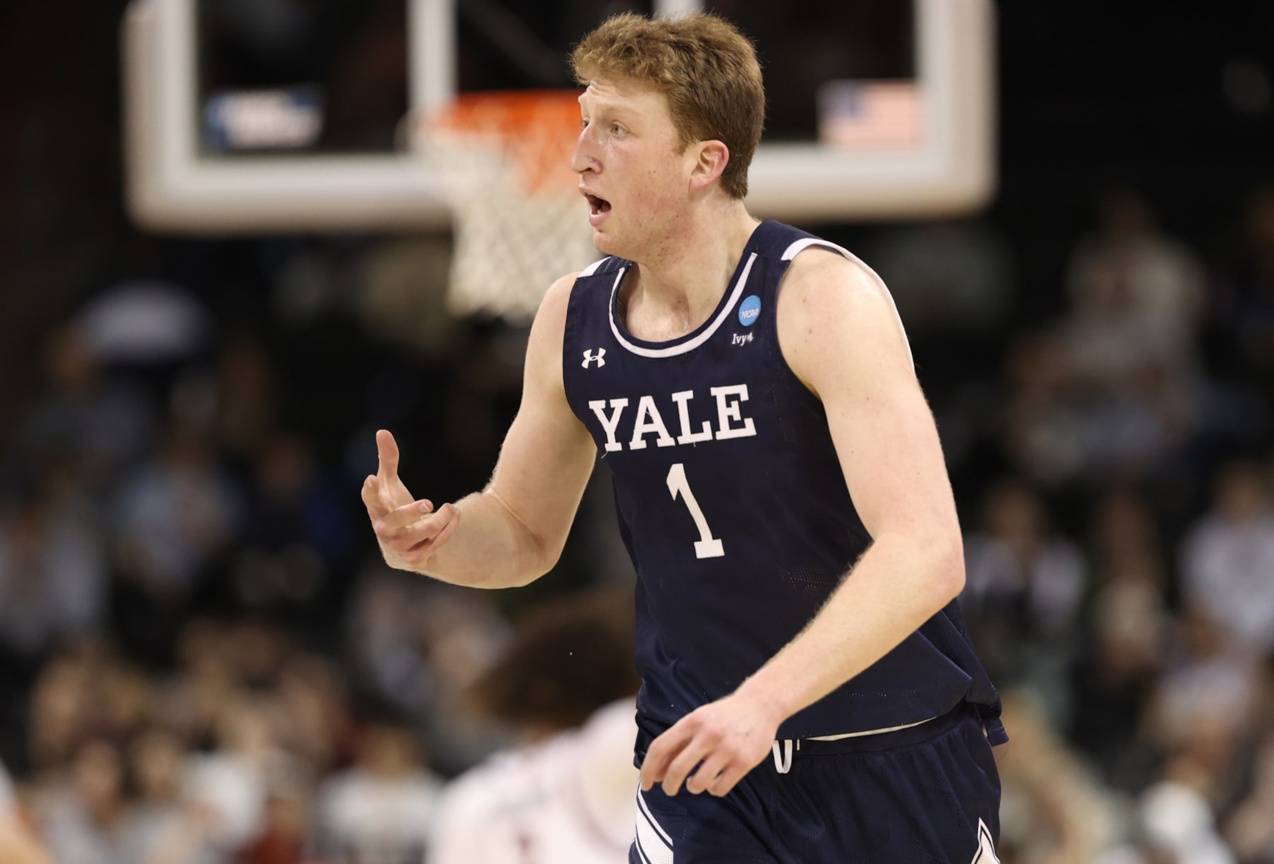 SPOKANE, WASHINGTON - MARCH 22: Danny Wolf #1 of the Yale Bulldogs reacts during the second half against the Auburn Tigers in the first round of the NCAA Men's Basketball Tournament at Spokane Veterans Memorial Arena on March 22, 2024 in Spokane, Washington. (Photo by Steph Chambers/Getty Images)