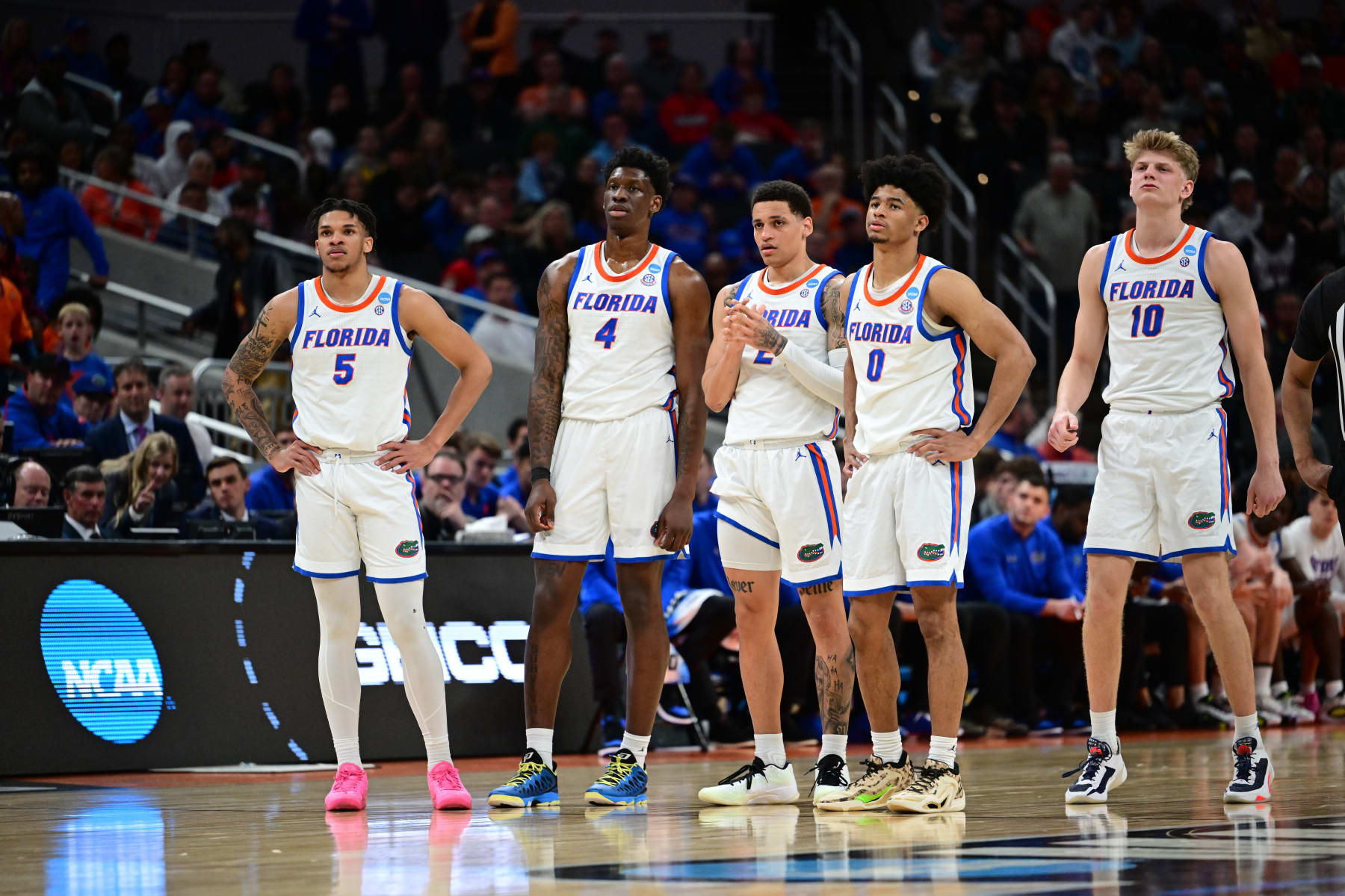 INDIANAPOLIS, INDIANA - MARCH 22: The Florida Gators  look on during a review during the first round of the 2024 NCAA Men's Basketball Tournament held at Gainbridge Fieldhouse on March 22, 2024 in Indianapolis, Indiana. (Photo by Ben Solomon/NCAA Photos via Getty Images)