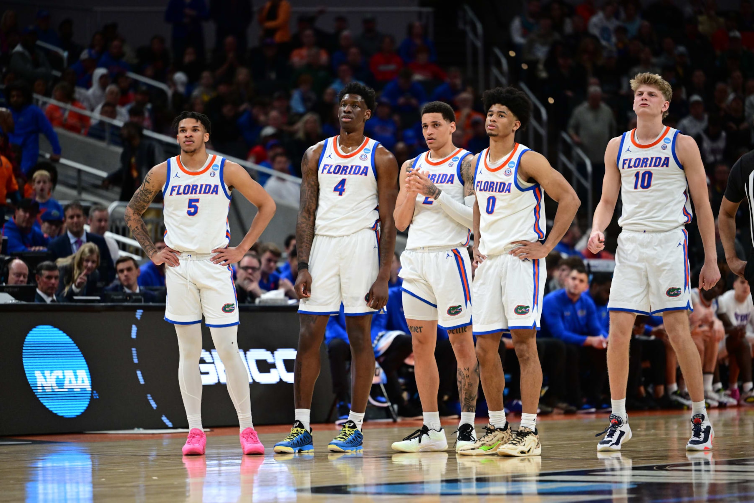INDIANAPOLIS, INDIANA - MARCH 22: The Florida Gators  look on during a review during the first round of the 2024 NCAA Men's Basketball Tournament held at Gainbridge Fieldhouse on March 22, 2024 in Indianapolis, Indiana. (Photo by Ben Solomon/NCAA Photos via Getty Images)