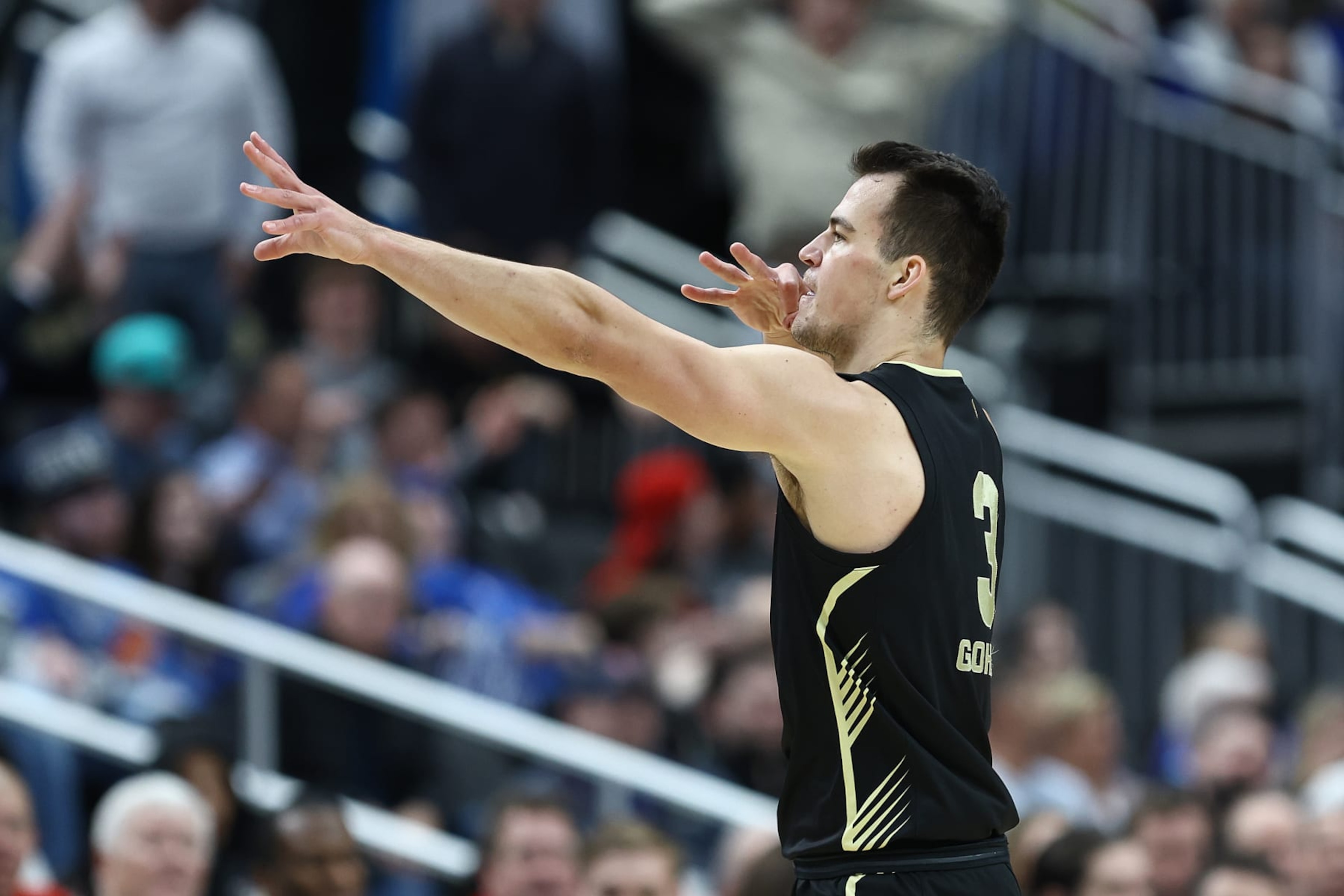 PITTSBURGH, PENNSYLVANIA - MARCH 21: Jack Gohlke #3 of the Oakland Golden Grizzlies reacts after scoring a three pointer against the Kentucky Wildcats during the first half in the first round of the NCAA Men's Basketball Tournament at PPG PAINTS Arena on March 21, 2024 in Pittsburgh, Pennsylvania. (Photo by Tim Nwachukwu/Getty Images) PITTSBURGH, PENNSYLVANIA - MARCH 21: Jack Gohlke #3 of the Oakland Golden Grizzlies reacts after scoring a three pointer against the Kentucky Wildcats during the first half in the first round of the NCAA Men's Basketball Tournament at PPG PAINTS Arena on March 21, 2024 in Pittsburgh, Pennsylvania. (Photo by Tim Nwachukwu/Getty Images)
