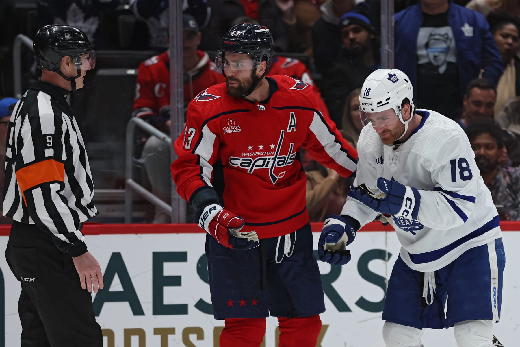 WASHINGTON, DC - MARCH 20: Tom Wilson #43 of the Washington Capitals reacts after he committed a high-sticking penalty on Noah Gregor #18 of the Toronto Maple Leafs during the third period at Capital One Arena on March 20, 2024 in Washington, DC. (Photo by Patrick Smith/Getty Images)