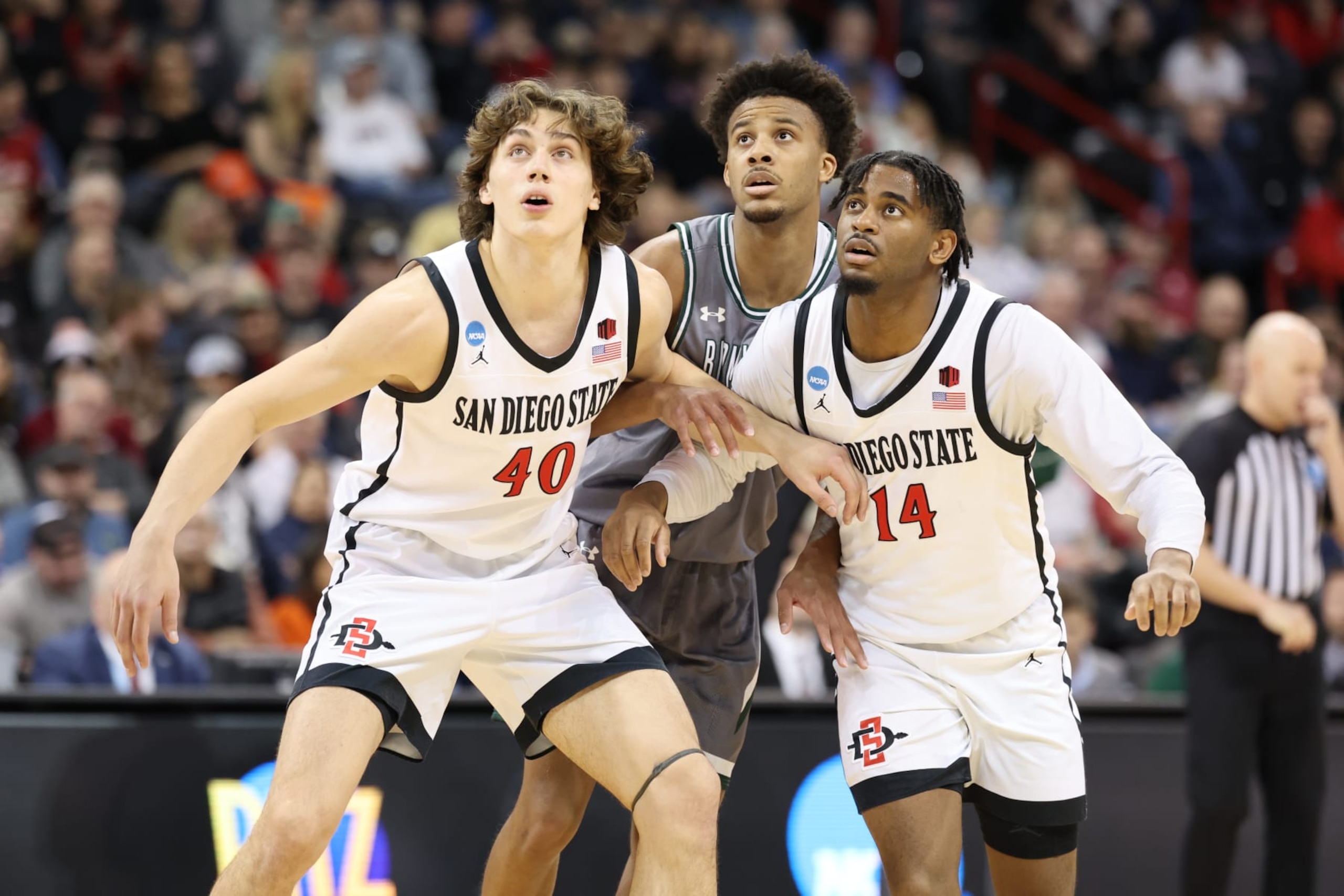 SPOKANE, WASHINGTON - MARCH 22: Miles Heide #40 of the San Diego State Aztecs and teammate Reese Waters #14 box out for a rebound against UAB Blazers during the first round of the 2024 NCAA Men's Basketball Tournament held at Spokane Veterans Memorial Arena on March 22, 2024 in Spokane, Washington. (Photo by C. Morgan Engel/NCAA Photos via Getty Images)