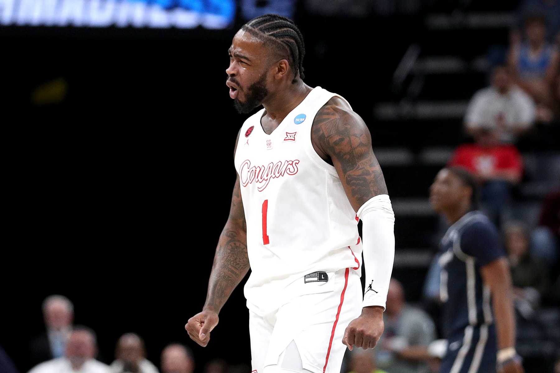 MEMPHIS, TENNESSEE - MARCH 22:  Jamal Shead #1 of the Houston Cougars celebrates a basket against the Longwood Lancers during the first half in the first round of the NCAA Men's Basketball Tournament at FedExForum on March 22, 2024 in Memphis, Tennessee. (Photo by Justin Ford/Getty Images)