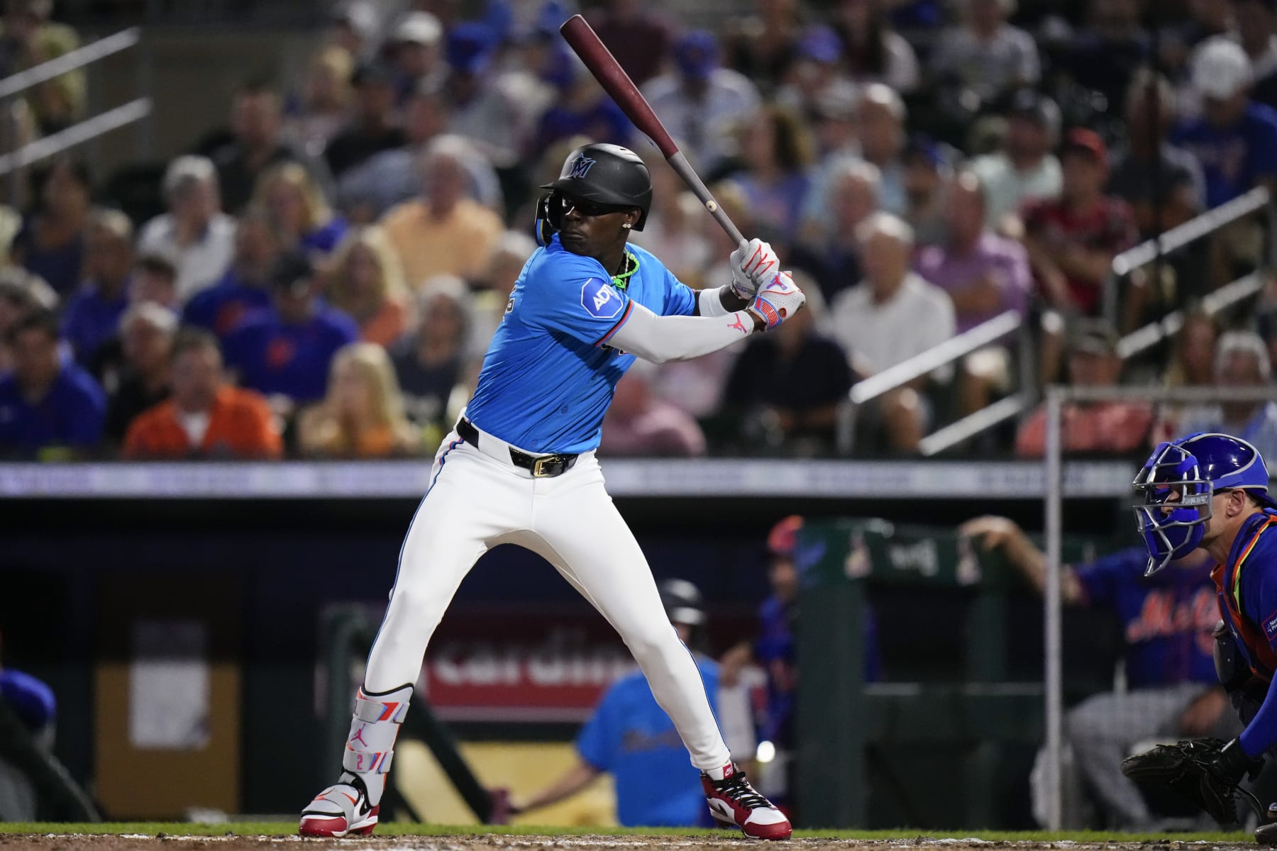 JUPITER, FLORIDA - MARCH 08: Jazz Chisholm Jr. #2 of the Miami Marlins at bat during a spring training game against the New York Mets at Roger Dean Stadium on March 08, 2024 in Jupiter, Florida. (Photo by Rich Storry/Getty Images)