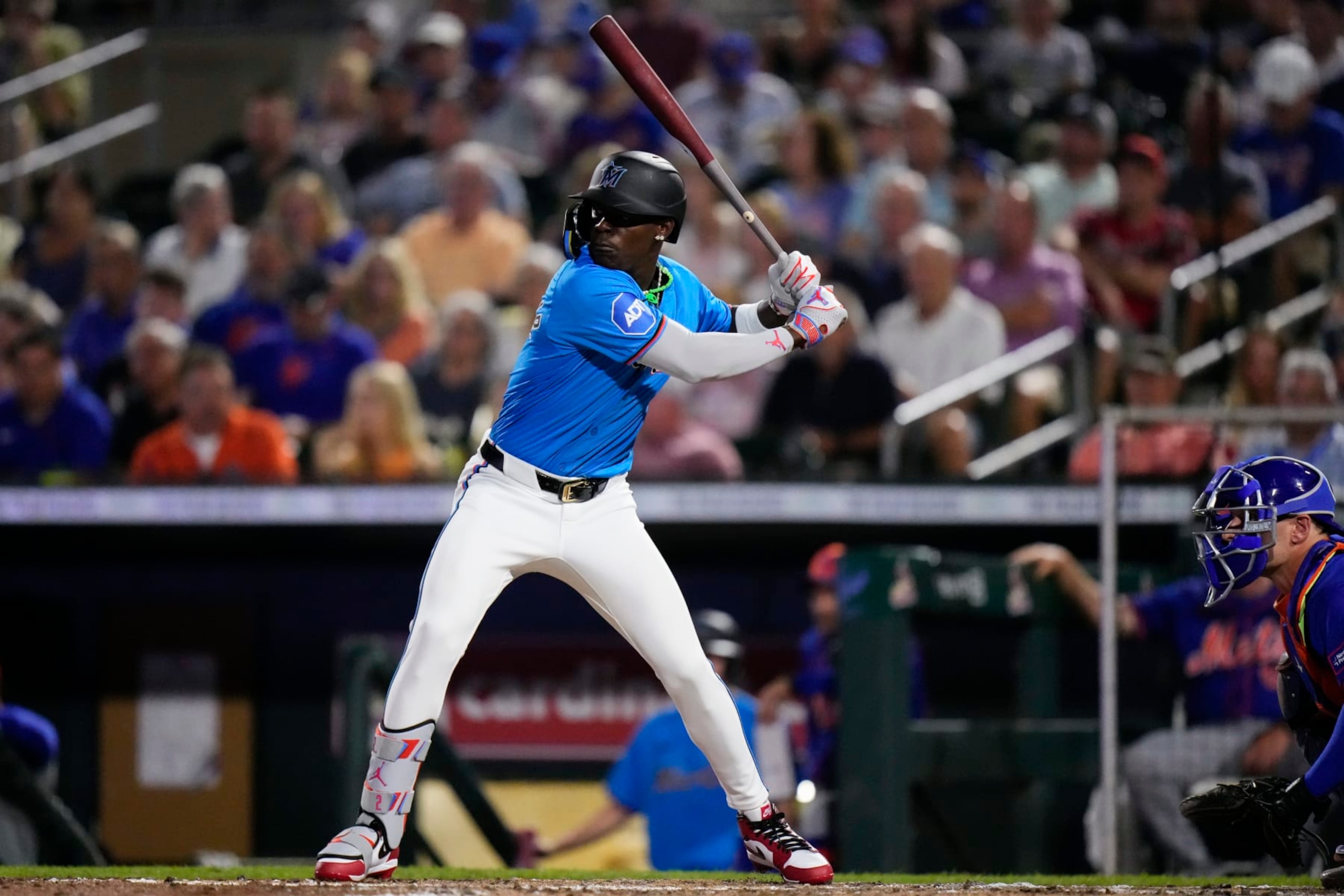 JUPITER, FLORIDA - MARCH 08: Jazz Chisholm Jr. #2 of the Miami Marlins at bat during a spring training game against the New York Mets at Roger Dean Stadium on March 08, 2024 in Jupiter, Florida. (Photo by Rich Storry/Getty Images)
