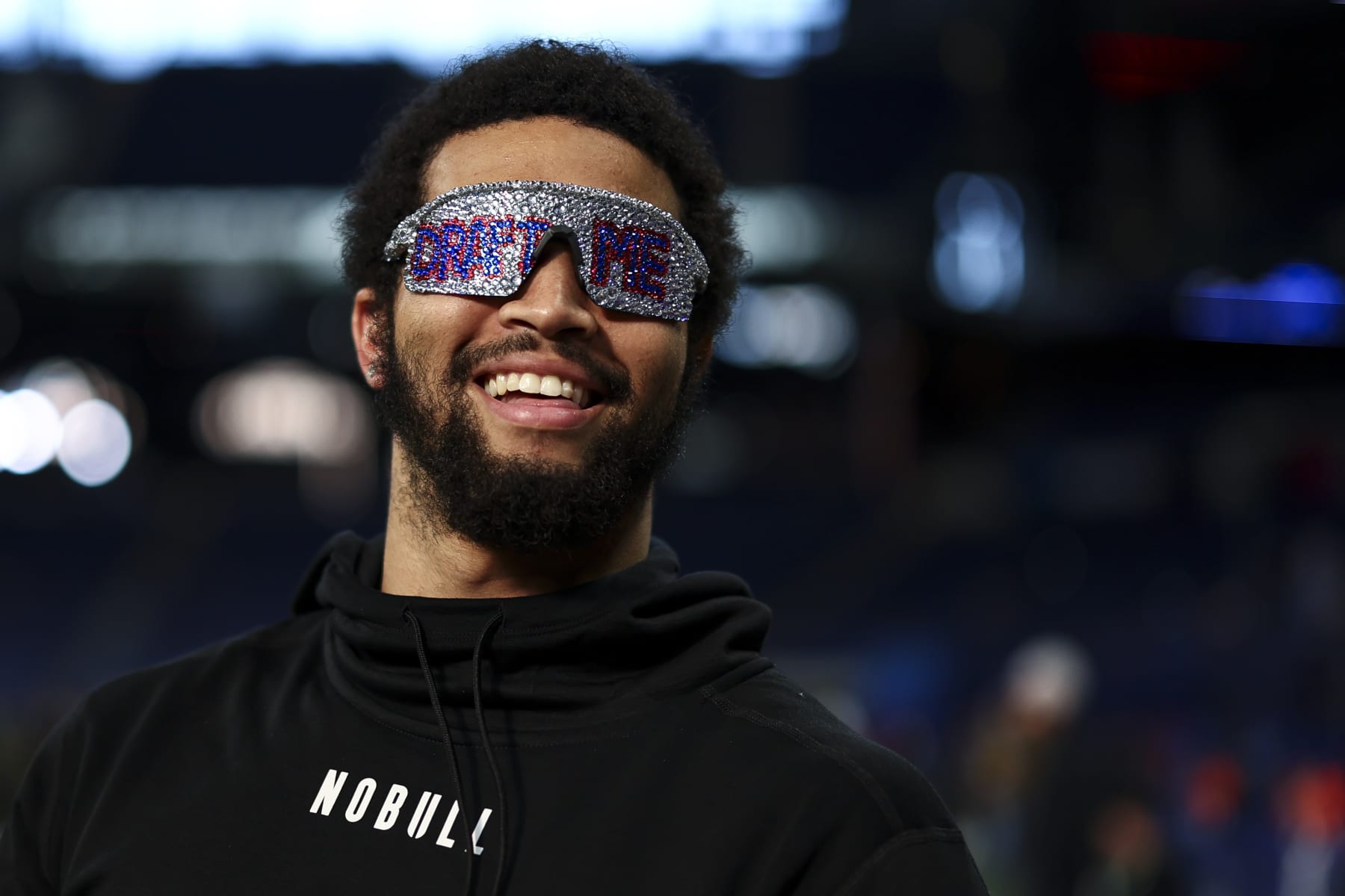 INDIANAPOLIS, INDIANA - MARCH 2: Caleb Williams #QB14 of Southern California smiles while wearing “Draft Me” sunglasses during the NFL Combine at the Indiana Convention Center on March 2, 2024 in Indianapolis, Indiana. (Photo by Kevin Sabitus/Getty Images)