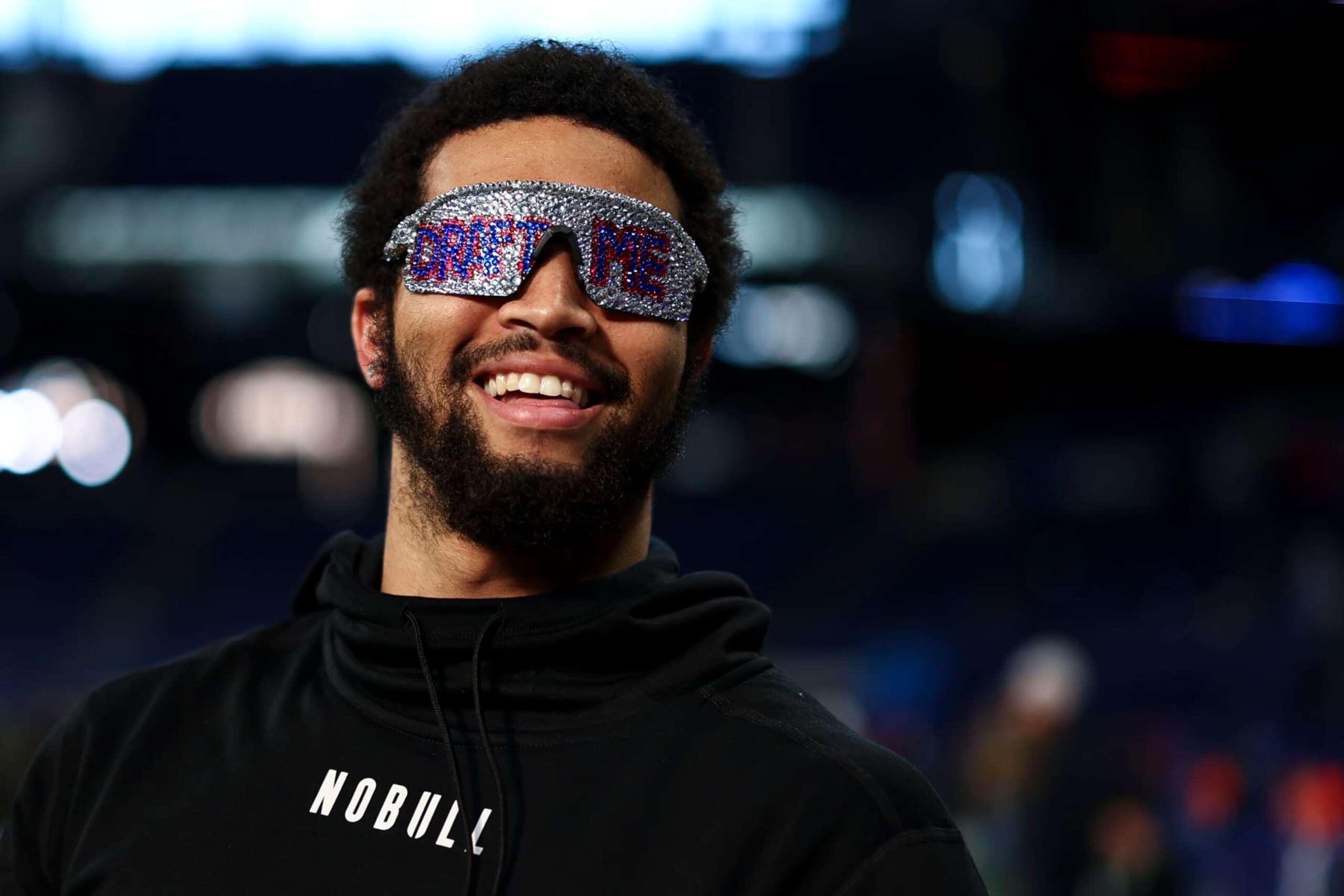 INDIANAPOLIS, INDIANA - MARCH 2: Caleb Williams #QB14 of Southern California smiles while wearing “Draft Me” sunglasses during the NFL Combine at the Indiana Convention Center on March 2, 2024 in Indianapolis, Indiana. (Photo by Kevin Sabitus/Getty Images)