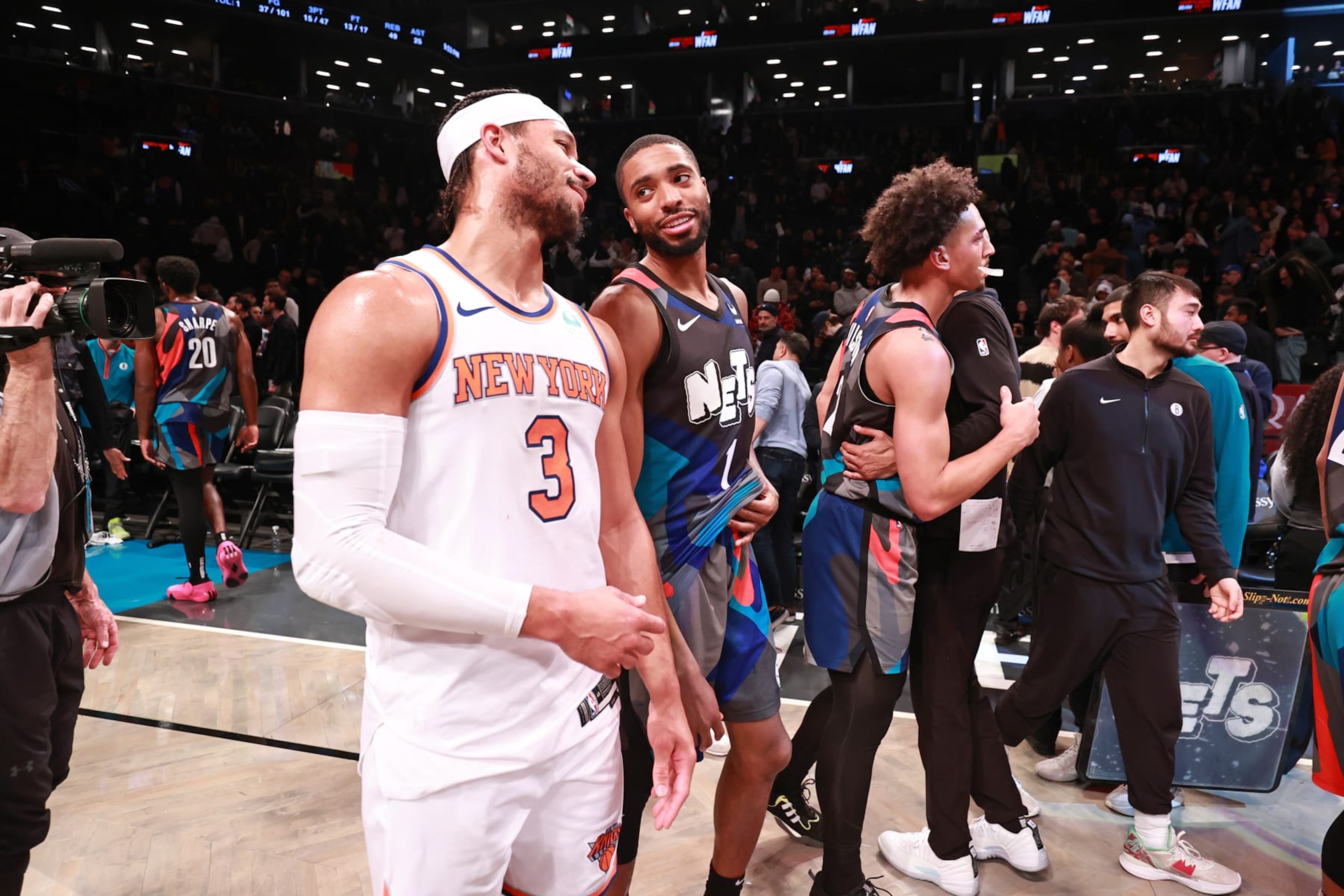 BROOKLYN, NY - DECEMBER 20: Josh Hart #3 of the New York Knicks talks to Mikal Bridges #1 of the Brooklyn Nets after the game on December 20, 2023 at Barclays Center in Brooklyn, New York. NOTE TO USER: User expressly acknowledges and agrees that, by downloading and or using this Photograph, user is consenting to the terms and conditions of the Getty Images License Agreement. Mandatory Copyright Notice: Copyright 2023 NBAE (Photo by Nathaniel S. Butler/NBAE via Getty Images) BROOKLYN, NY - DECEMBER 20: Josh Hart #3 of the New York Knicks talks to Mikal Bridges #1 of the Brooklyn Nets after the game on December 20, 2023 at Barclays Center in Brooklyn, New York. NOTE TO USER: User expressly acknowledges and agrees that, by downloading and or using this Photograph, user is consenting to the terms and conditions of the Getty Images License Agreement. Mandatory Copyright Notice: Copyright 2023 NBAE (Photo by Nathaniel S. Butler/NBAE via Getty Images)