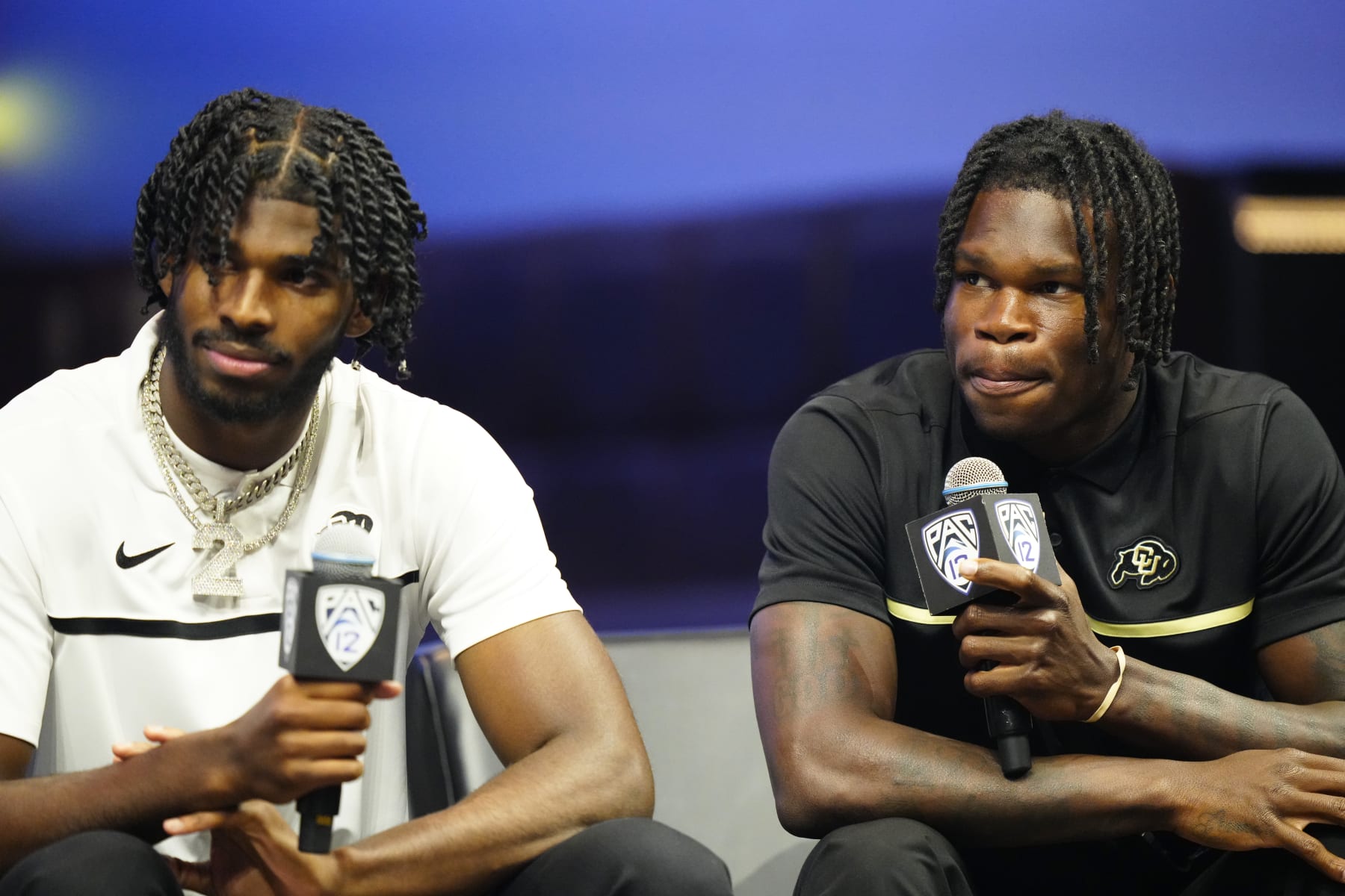 LAS VEGAS, NEVADA - JULY 21: (L-R) Shedeur Sanders #2 and Travis Hunter #12 of the University of Colorado Buffaloes speak with the media at Zouk Nightclub at Resorts World Las Vegas on July 21, 2023 in Las Vegas, Nevada. (Photo by Louis Grasse/Getty Images)