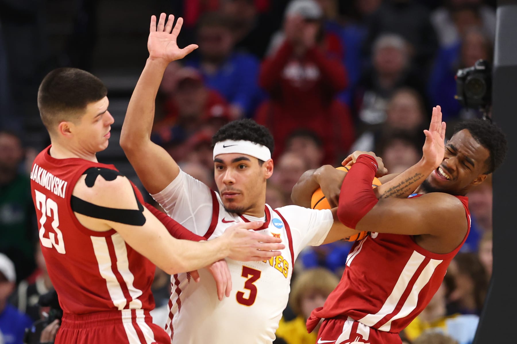 OMAHA, NEBRASKA - MARCH 23: Tamin Lipsey #3 of the Iowa State Cyclones battles against Andrej Jakimovski #23 of the Washington State Cougars during the second half in the second round of the NCAA Men's Basketball Tournament at CHI Health Center on March 23, 2024 in Omaha, Nebraska. (Photo by Michael Reaves/Getty Images)