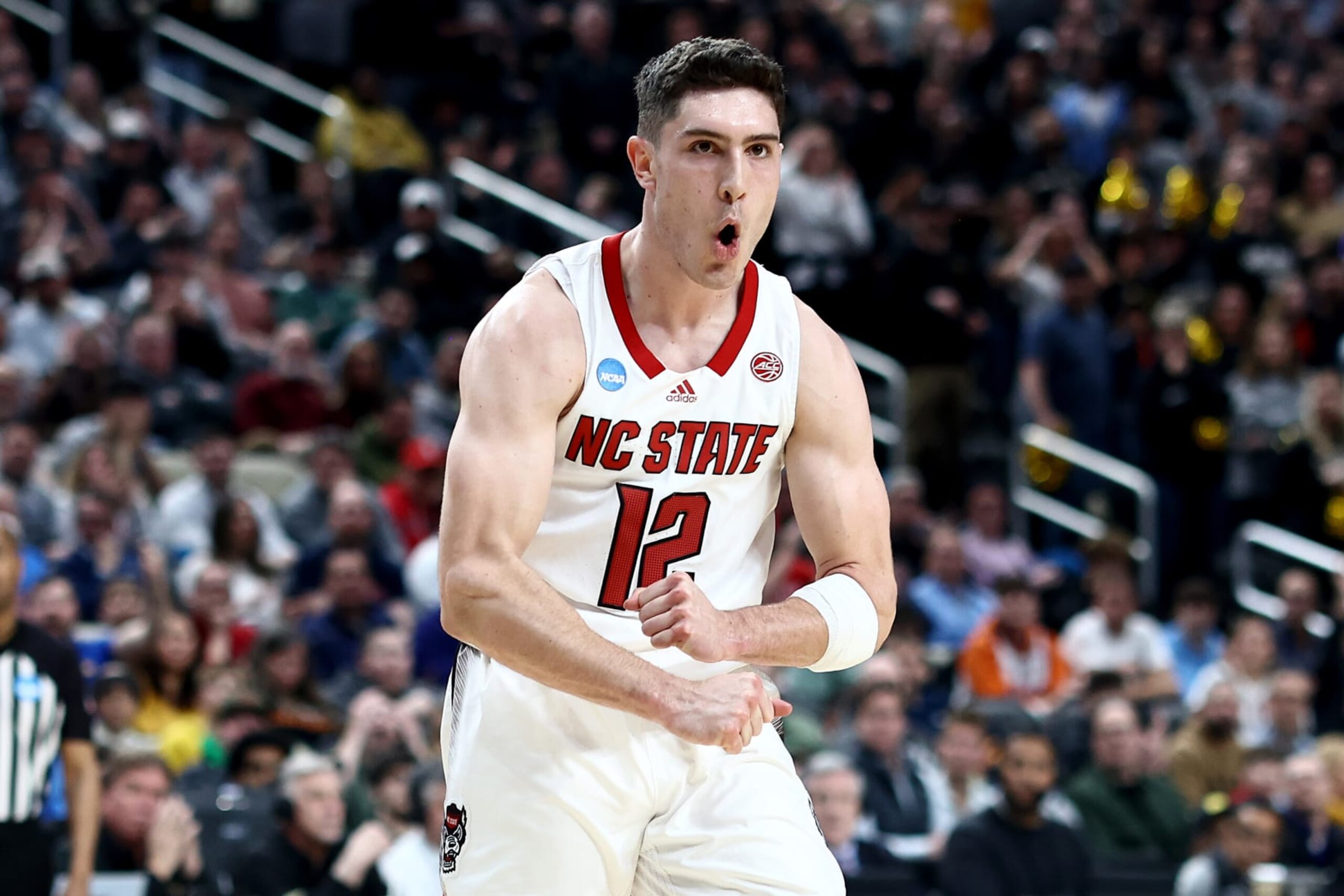 PITTSBURGH, PENNSYLVANIA - MARCH 23: Michael O'Connell #12 of the North Carolina State Wolfpack reacts during the second half of a game against the Oakland Golden Grizzlies in the second round of the NCAA Men's Basketball Tournament at PPG PAINTS Arena on March 23, 2024 in Pittsburgh, Pennsylvania. (Photo by Tim Nwachukwu/Getty Images)