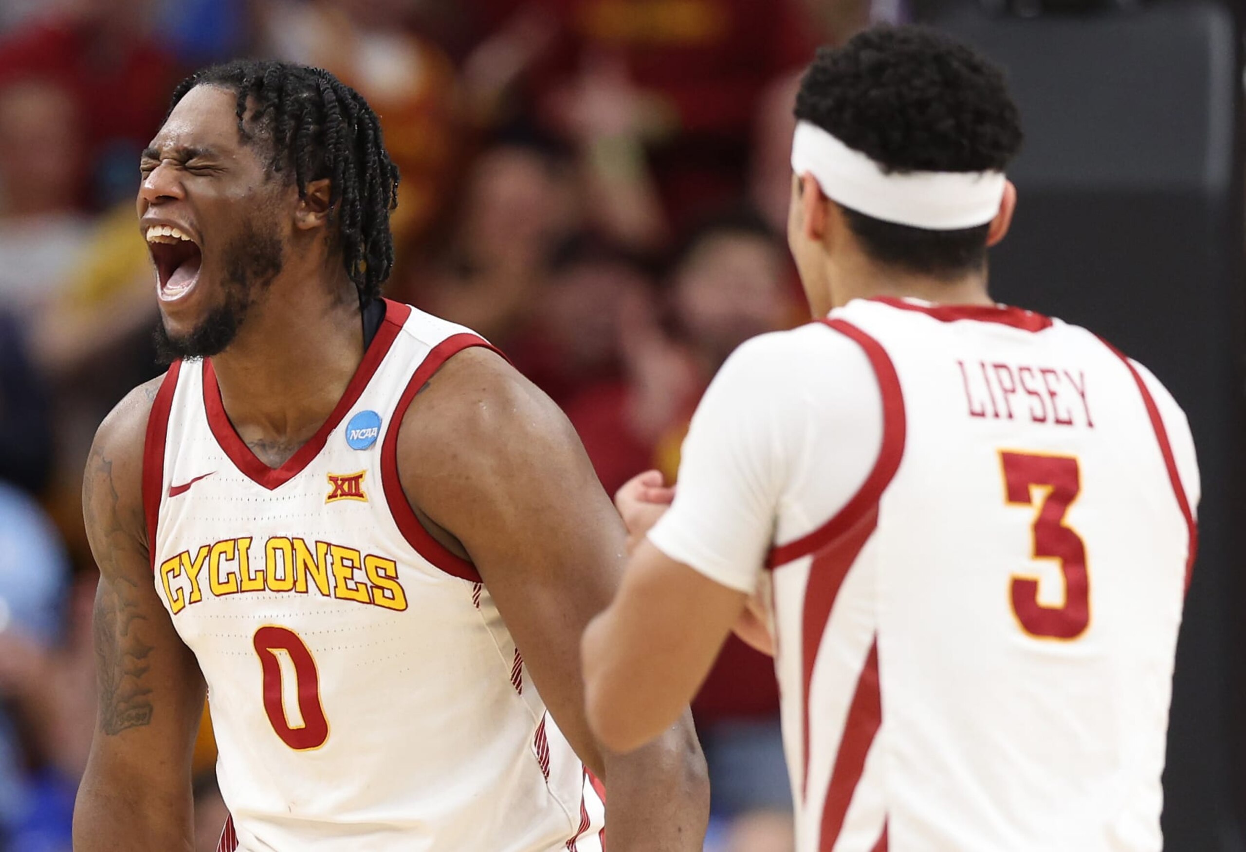 OMAHA, NEBRASKA - MARCH 23: Tre King #0 and Tamin Lipsey #3 of the Iowa State Cyclones celebrate during the second half against the Washington State Cougars in the second round of the NCAA Men's Basketball Tournament at CHI Health Center on March 23, 2024 in Omaha, Nebraska. (Photo by Jamie Squire/Getty Images)