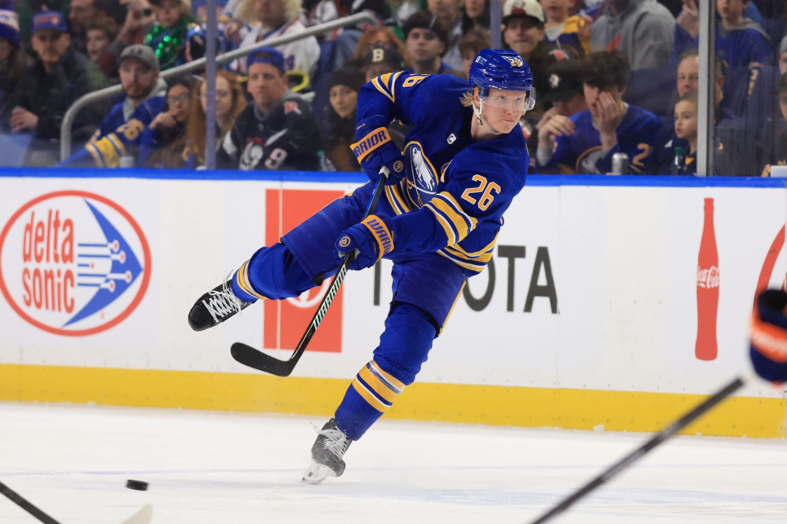BUFFALO, NEW YORK - MARCH 14: Rasmus Dahlin #26 of the Buffalo Sabres passes the puck during an NHL game against the New York Islanders at KeyBank Center on March 14, 2024 in Buffalo, New York. (Photo by Bill Wippert/NHLI via Getty Images)