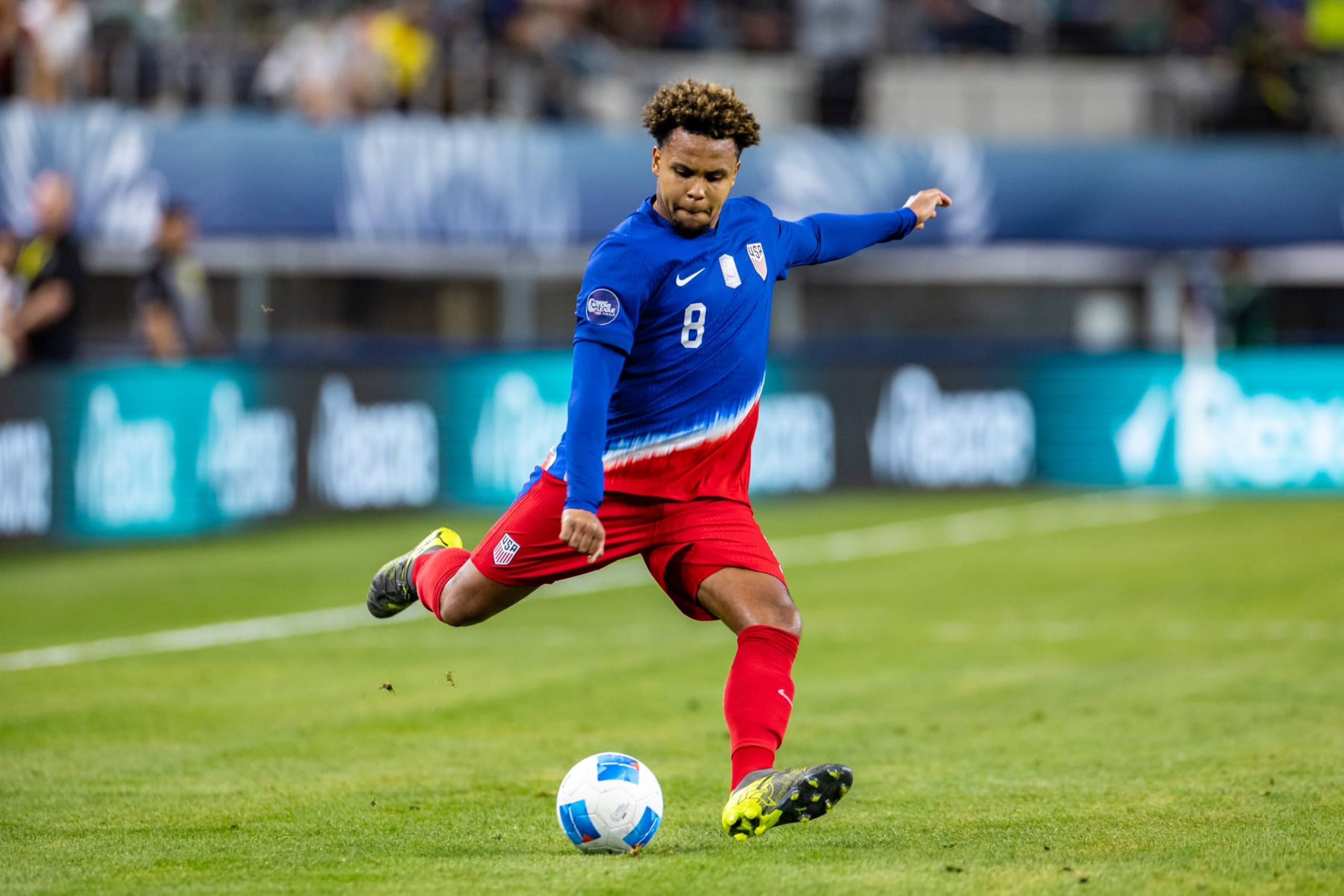 ARLINGTON, TX - MARCH 21: United States midfielder Weston McKennie (#8) crosses the ball during the Concacaf Nations League semi final match between the United States and Jamaica on March 21, 2024 at AT&T Stadium in Arlington, Texas.  (Photo by Matthew Visinsky/Icon Sportswire via Getty Images)
