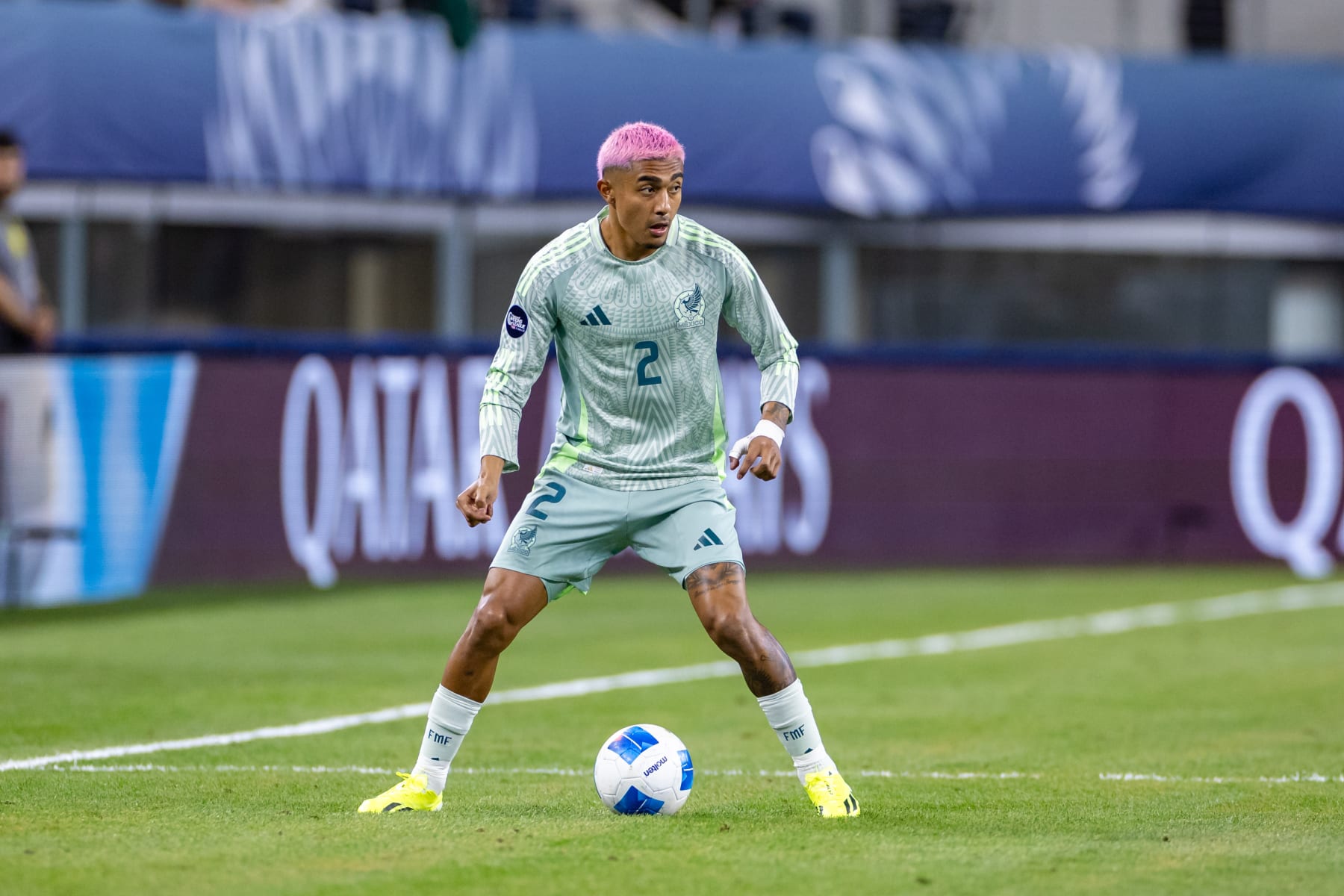 ARLINGTON, TX - MARCH 21: Mexico defender Julian Araujo (#2) dribbles up field during the Concacaf Nations League semi final match between Mexico and Panama on March 21, 2024 at AT&T Stadium in Arlington, Texas.  (Photo by Matthew Visinsky/Icon Sportswire via Getty Images)