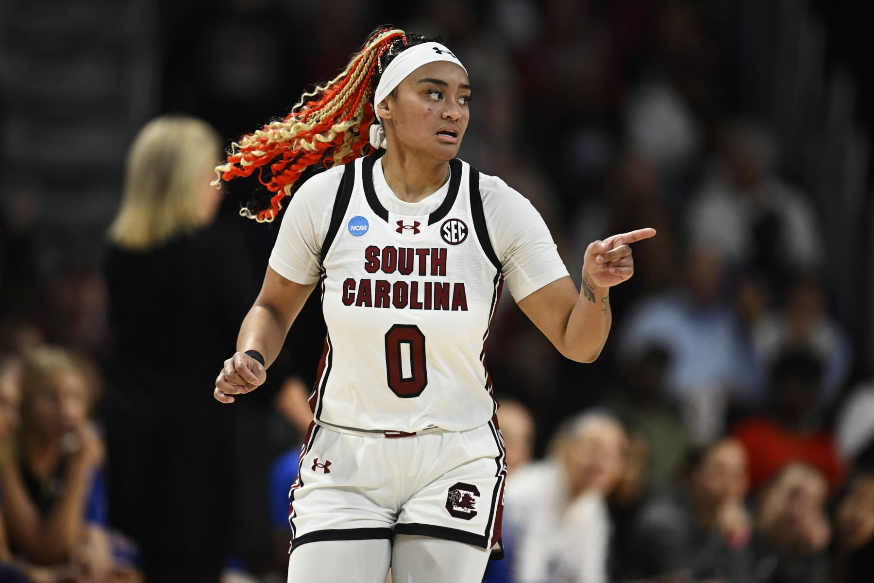 COLUMBIA, SOUTH CAROLINA - MARCH 22: Te-Hina Paopao #0 of the South Carolina Gamecocks celebrates her three-point basket against the Presbyterian Blue Hose in the second quarter during the first round of the NCAA Women’s Basketball Tournament at Colonial Life Arena on March 22, 2024 in Columbia, South Carolina. (Photo by Eakin Howard/Getty Images)