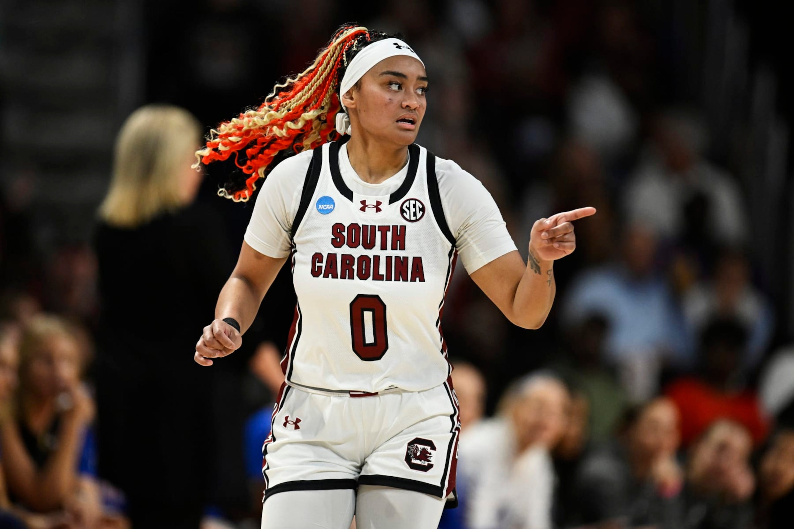 COLUMBIA, SOUTH CAROLINA - MARCH 22: Te-Hina Paopao #0 of the South Carolina Gamecocks celebrates her three-point basket against the Presbyterian Blue Hose in the second quarter during the first round of the NCAA Women’s Basketball Tournament at Colonial Life Arena on March 22, 2024 in Columbia, South Carolina. (Photo by Eakin Howard/Getty Images)