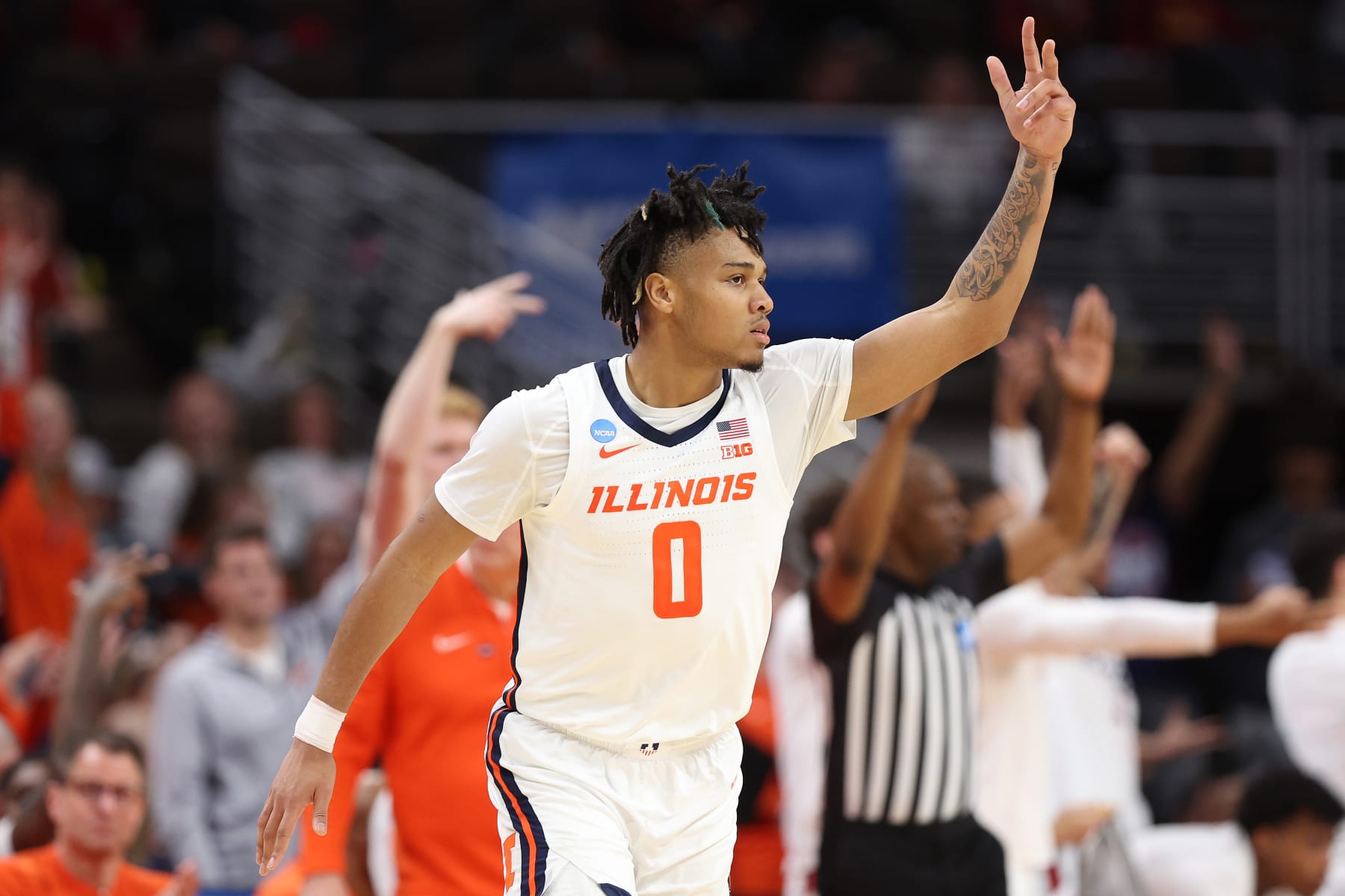 OMAHA, NEBRASKA - MARCH 23: Terrence Shannon Jr. #0 of the Illinois Fighting Illini reacts after making a three-point basket during the second half against the Duquesne Dukes in the second round of the NCAA Men's Basketball Tournament at CHI Health Center on March 23, 2024 in Omaha, Nebraska. (Photo by Jamie Squire/Getty Images)