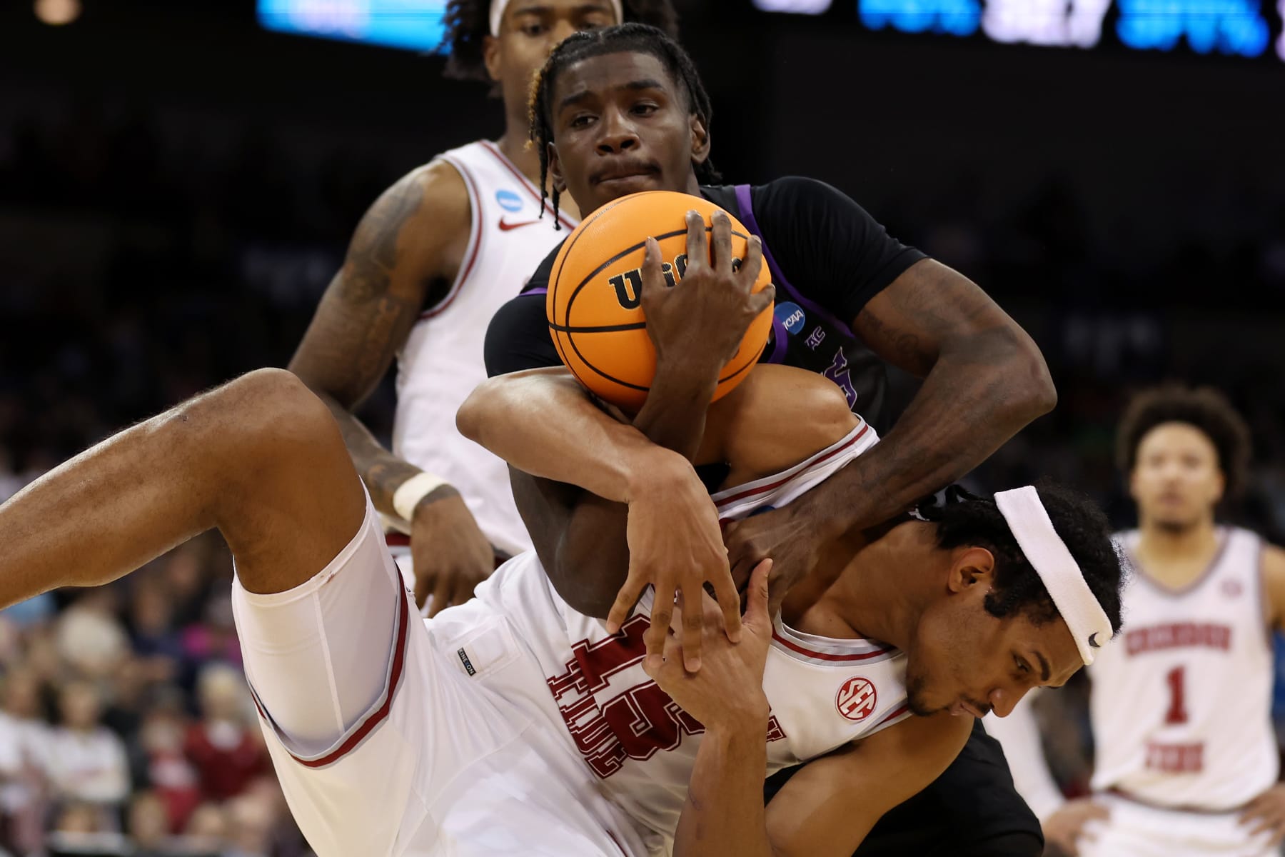 SPOKANE, WASHINGTON - MARCH 24: Tyon Grant-Foster #7 of the Grand Canyon Antelopes and Jarin Stevenson #15 of the Alabama Crimson Tide fight for the rebound during the second half in the second round of the NCAA Men's Basketball Tournament at Spokane Veterans Memorial Arena on March 24, 2024 in Spokane, Washington. (Photo by Steph Chambers/Getty Images)
