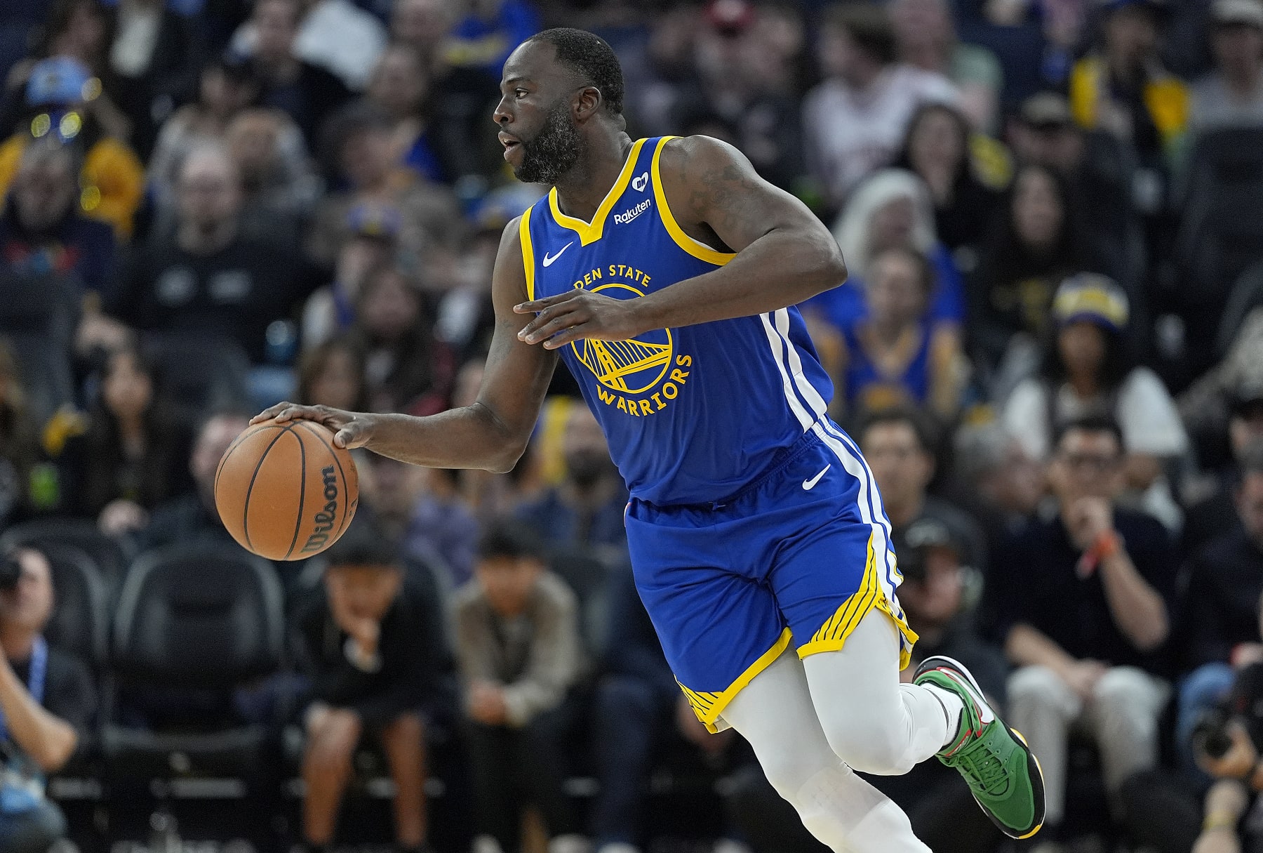 SAN FRANCISCO, CALIFORNIA - MARCH 09: Draymond Green #23 of the Golden State Warriors dribbles the ball up court against the San Antonio Spurs during the second quarter at Chase Center on March 09, 2024 in San Francisco, California. NOTE TO USER: User expressly acknowledges and agrees that, by downloading and or using this photograph, User is consenting to the terms and conditions of the Getty Images License Agreement. (Photo by Thearon W. Henderson/Getty Images)