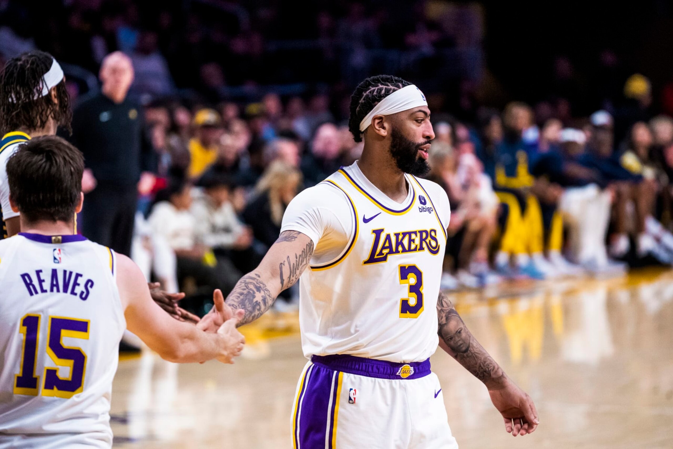 LOS ANGELES, CA - MARCH 24: Austin Reaves #15 high fives Anthony Davis #3 of the Los Angeles Lakers during the game against the Indiana Pacers on March 24, 2024 at Crypto.Com Arena in Los Angeles, California. NOTE TO USER: User expressly acknowledges and agrees that, by downloading and/or using this Photograph, user is consenting to the terms and conditions of the Getty Images License Agreement. Mandatory Copyright Notice: Copyright 2024 NBAE (Photo by Tyler Ross/NBAE via Getty Images) LOS ANGELES, CA - MARCH 24: Austin Reaves #15 high fives Anthony Davis #3 of the Los Angeles Lakers during the game against the Indiana Pacers on March 24, 2024 at Crypto.Com Arena in Los Angeles, California. NOTE TO USER: User expressly acknowledges and agrees that, by downloading and/or using this Photograph, user is consenting to the terms and conditions of the Getty Images License Agreement. Mandatory Copyright Notice: Copyright 2024 NBAE (Photo by Tyler Ross/NBAE via Getty Images)