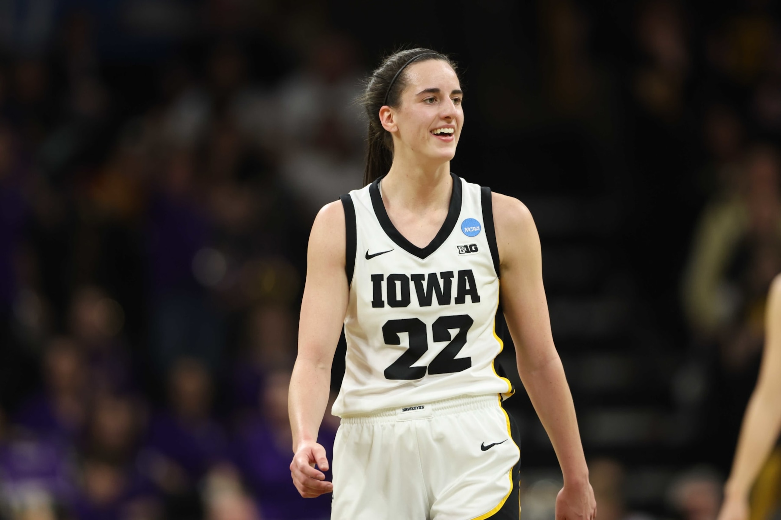 IOWA CITY, IOWA - MARCH 23: Caitlin Clark #22 of the Iowa Hawkeyes looks on after scoring a basket against the Holy Cross Crusaders during the first round of the 2024 NCAA Women's Basketball Tournament held at Carver-Hawkeye Arena on March 23, 2024 in Iowa City, Iowa. (Photo by Rebecca Gratz/NCAA Photos via Getty Images)