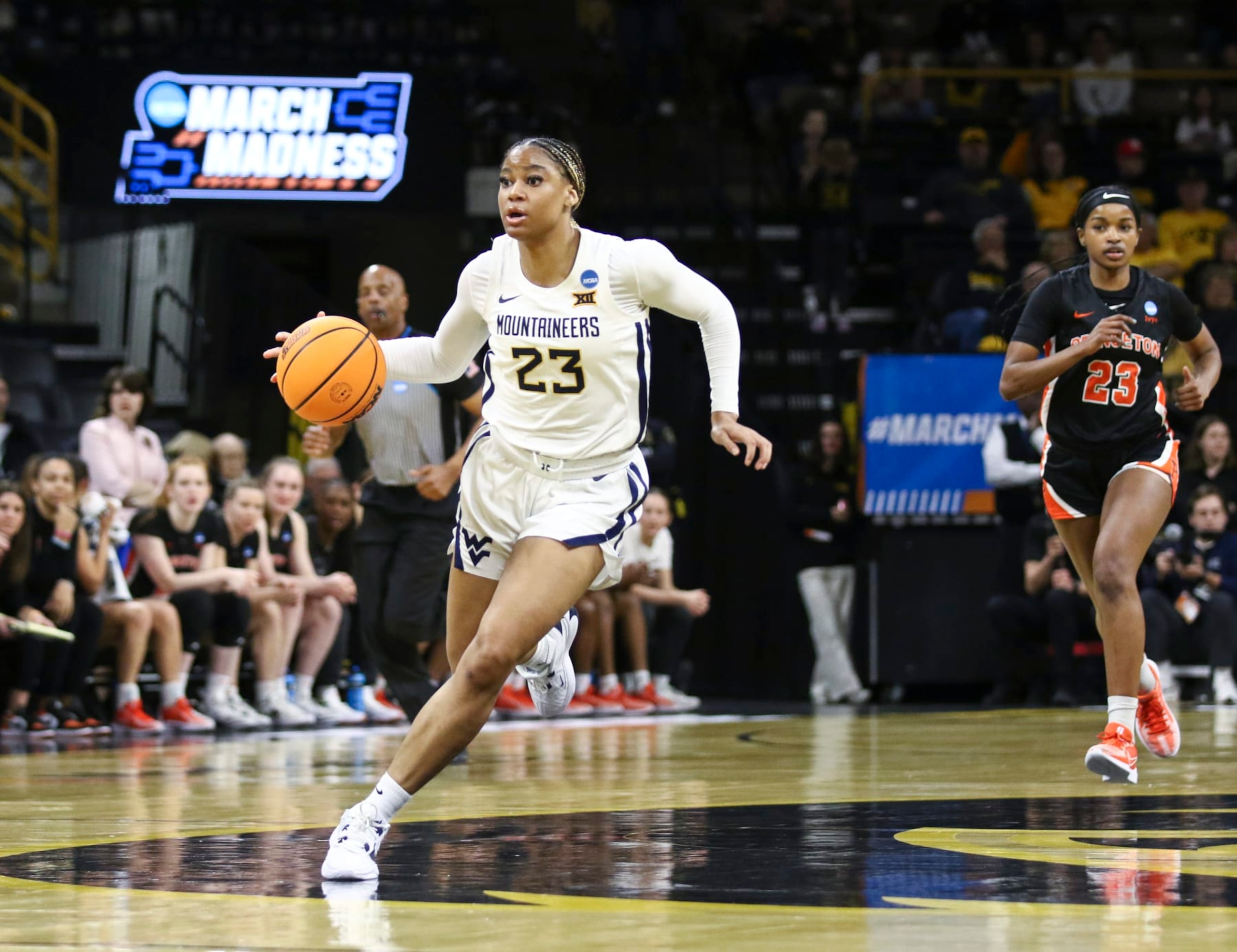 IOWA CITY, IOWA- MARCH 23:  Guard Lauren Fields #23 of the West Virginia Mountaineers drives drown the court during the second half against the Princeton Tigers during their match-up in the 2024 NCAA Division 1 Women's Basketball Championship at Carver-Hawkeye Arena on March 23, 2024 in Iowa City, Iowa.  (Photo by Matthew Holst/Getty Images)