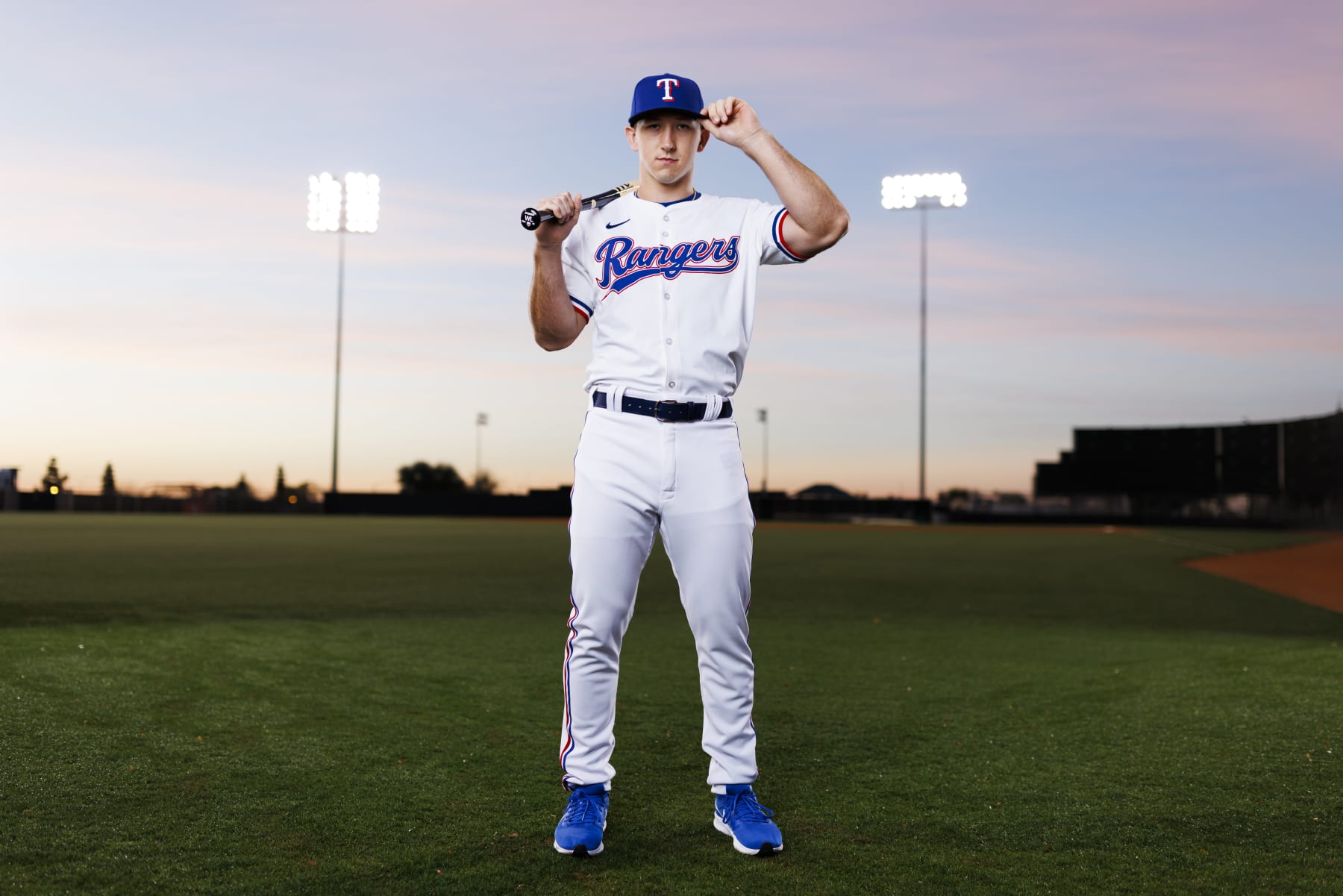 SURPRISE, AZ - FEBRUARY 20: Outfielder Wyatt Langford (82) poses for a portrait during Texas Rangers photo day on February 20, 2024 at Surprise Stadium in Surprise, AZ. (Photo by Ric Tapia/Icon Sportswire via Getty Images)