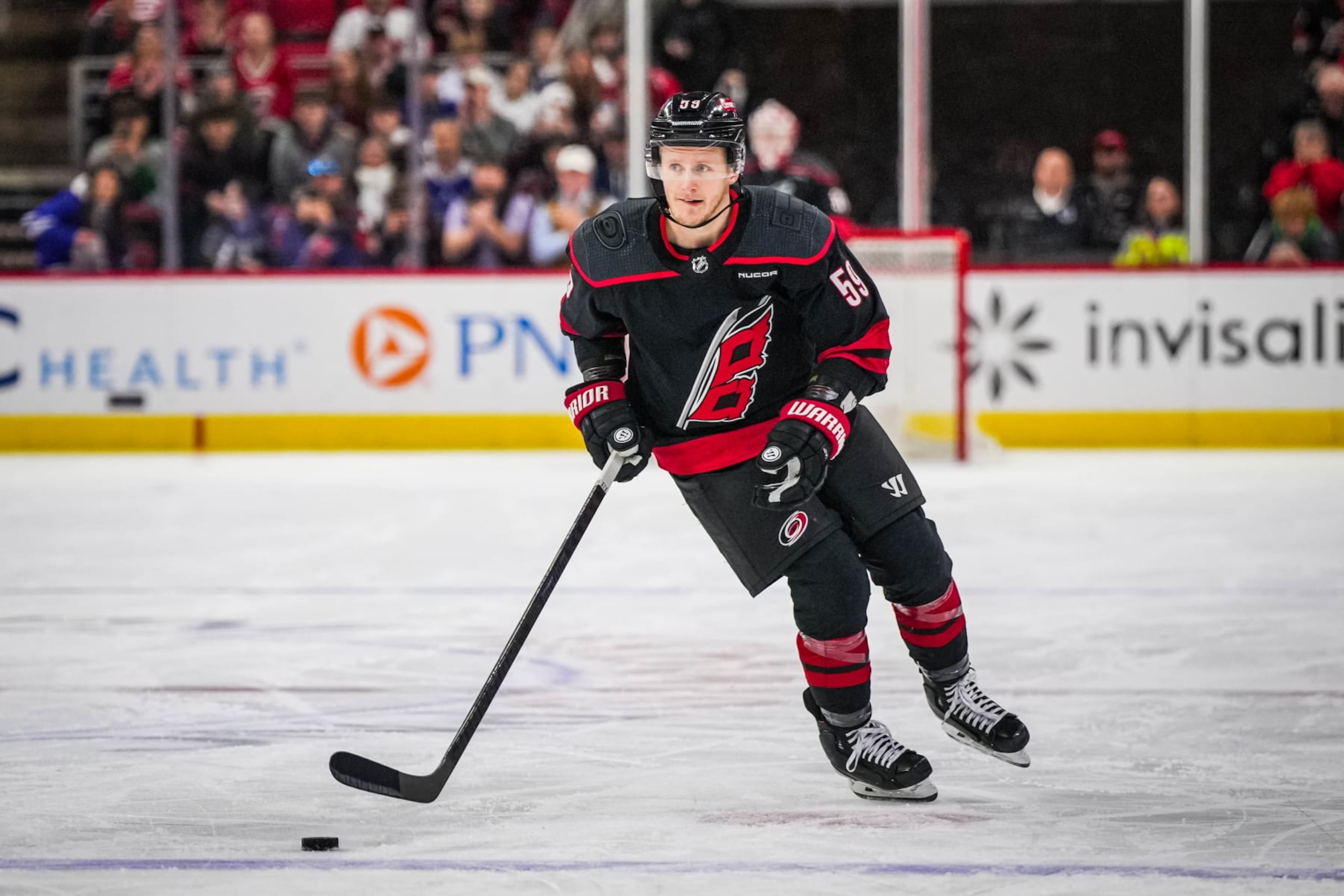 RALEIGH, NORTH CAROLINA - MARCH 24: Jake Guentzel #59 of the Carolina Hurricanes controls the puck during the first period in the game against the Toronto Maple Leafs at PNC Arena on March 24, 2024 in Raleigh, North Carolina. (Photo by Josh Lavallee/NHLI via Getty Images) RALEIGH, NORTH CAROLINA - MARCH 24: Jake Guentzel #59 of the Carolina Hurricanes controls the puck during the first period in the game against the Toronto Maple Leafs at PNC Arena on March 24, 2024 in Raleigh, North Carolina. (Photo by Josh Lavallee/NHLI via Getty Images)