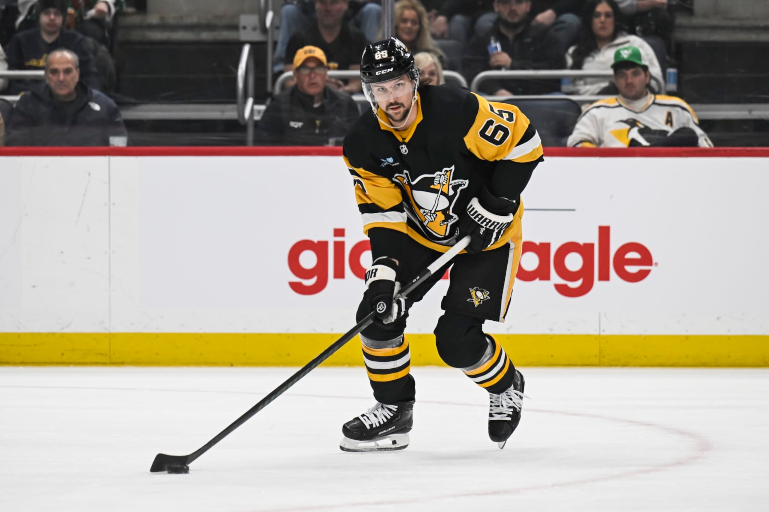 PITTSBURGH, PA - MARCH 17: Pittsburgh Penguins defenseman Erik Karlsson (65) skates with the puck during the first period in the NHL game between the Pittsburgh Penguins and the Detroit Red Wings on March 17, 2024, at PPG Paints Arena in Pittsburgh, PA. (Photo by Jeanine Leech/Icon Sportswire via Getty Images) PITTSBURGH, PA - MARCH 17: Pittsburgh Penguins defenseman Erik Karlsson (65) skates with the puck during the first period in the NHL game between the Pittsburgh Penguins and the Detroit Red Wings on March 17, 2024, at PPG Paints Arena in Pittsburgh, PA. (Photo by Jeanine Leech/Icon Sportswire via Getty Images)