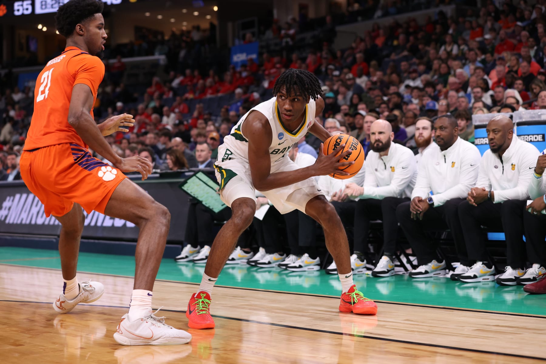 MEMPHIS, TENNESSEE - MARCH 24: Ja'Kobe Walter #4 of the Baylor Bears is defended by Chauncey Wiggins #21 of the Clemson Tigers during the second round of the 2024 NCAA Men's Basketball Tournament held at FedExForum on March 24, 2024 in Memphis, Tennessee. (Photo by Joe Murphy/NCAA Photos via Getty Images)