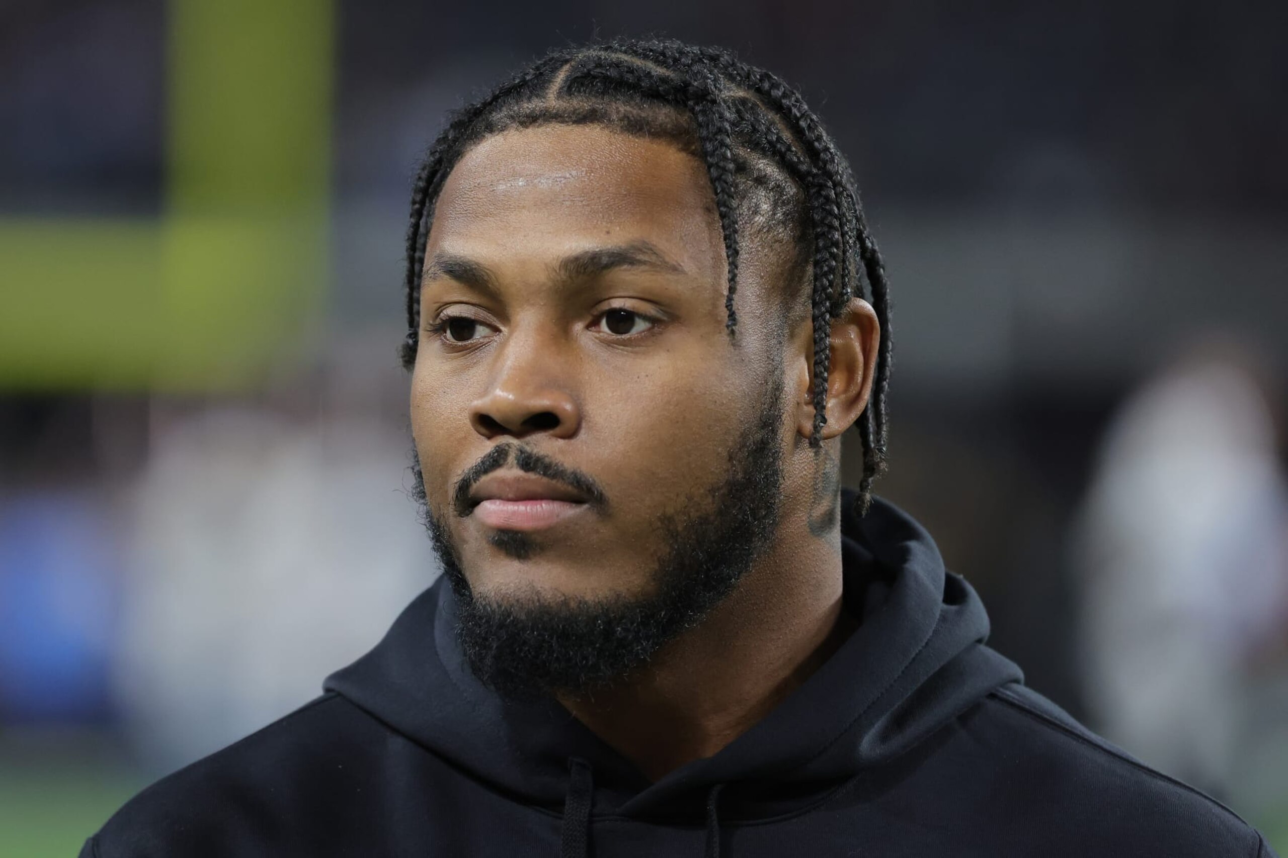 LAS VEGAS, NEVADA - DECEMBER 14: Running back Josh Jacobs #8 of the Las Vegas Raiders looks on before the team's game against the Los Angeles Chargers at Allegiant Stadium on December 14, 2023 in Las Vegas, Nevada. (Photo by Ethan Miller/Getty Images)