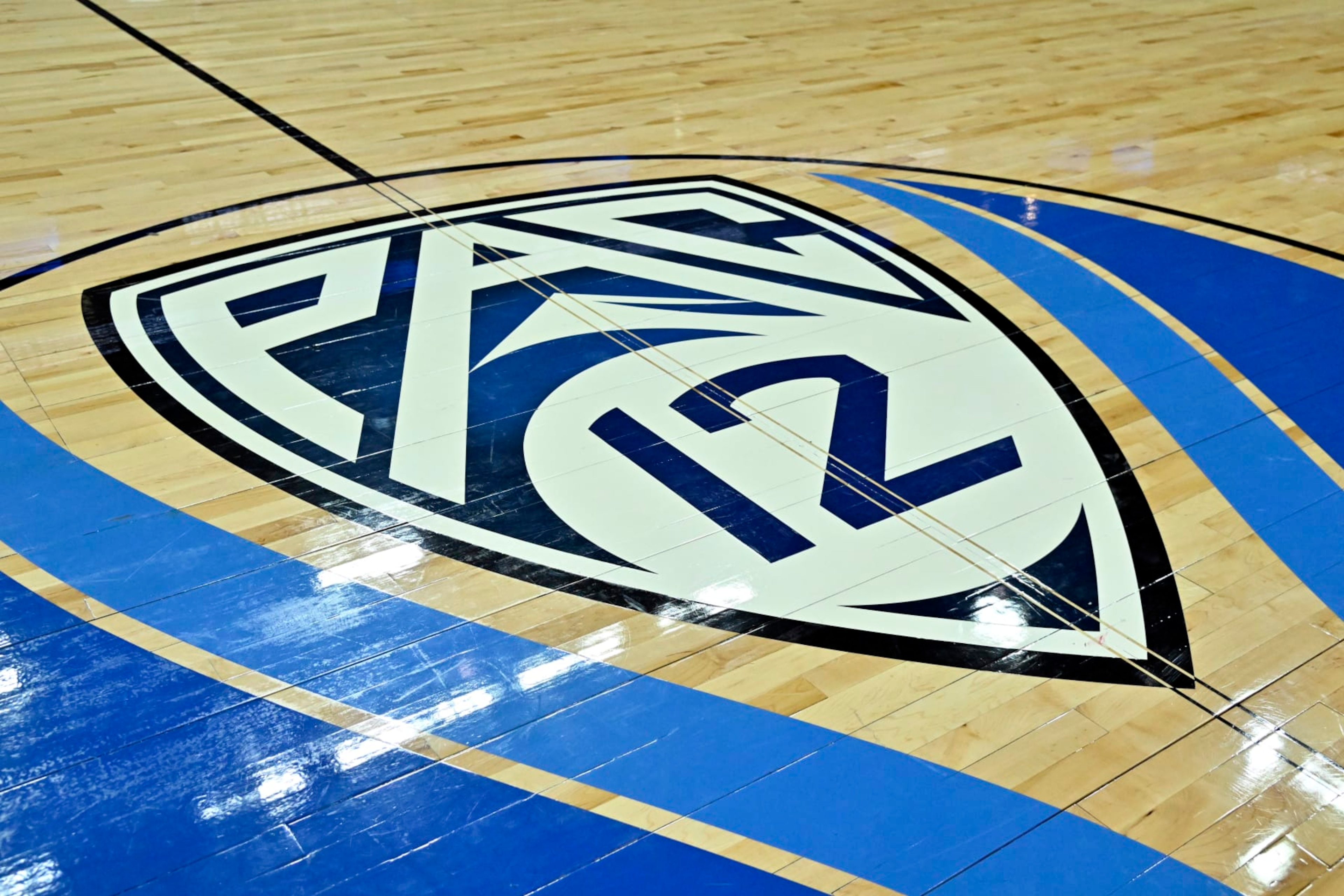 LAS VEGAS, NEVADA - MARCH 15: A Pac-12 tournament logo is shown on the court before a semifinal game between the Arizona Wildcats and the Oregon Ducks in the Pac-12 Conference basketball tournament at T-Mobile Arena on March 15, 2024 in Las Vegas, Nevada. (Photo by David Becker/Getty Images)