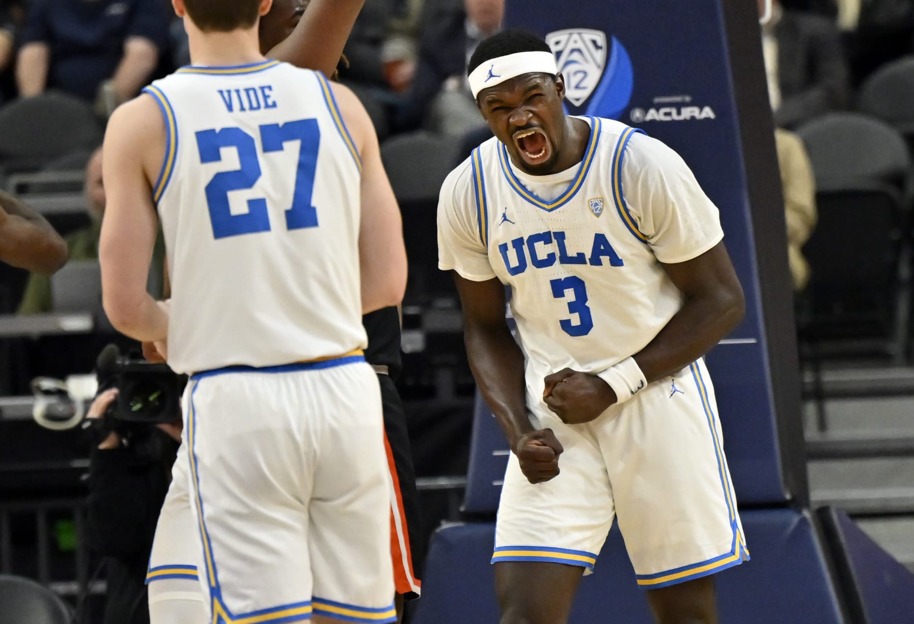 LAS VEGAS, NEVADA - MARCH 13: Adem Bona #3 of the UCLA Bruins reacts after a shot against the Oregon State Beavers during the second half of a first round game in the Pac-12 Conference basketball tournament at T-Mobile Arena on March 13, 2024 in Las Vegas, Nevada. The Bruins defeated the Beavers 67-57.  (Photo by David Becker/Getty Images)
