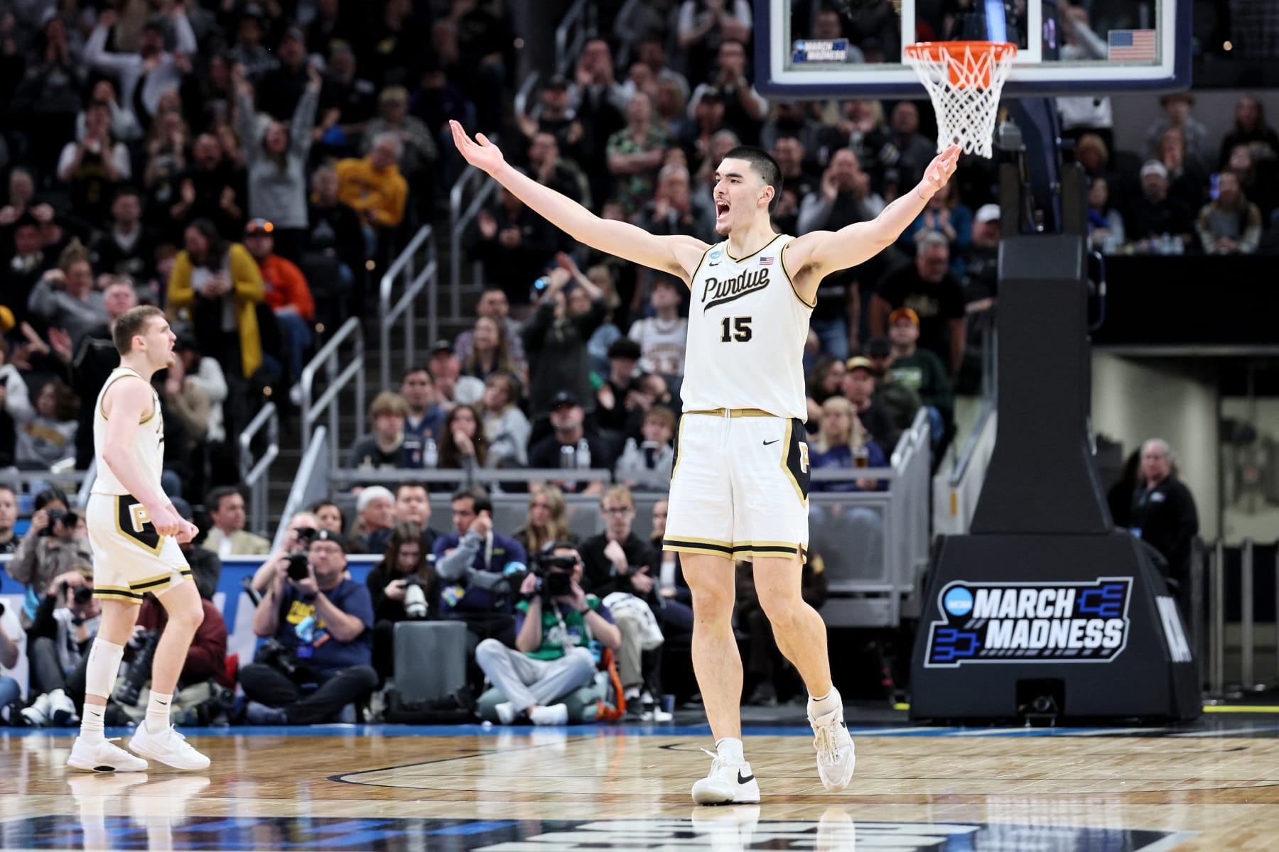 INDIANAPOLIS, INDIANA - MARCH 24: Zach Edey #15 of the Purdue Boilermakers celebrates a basket against the Utah State Aggies during the second half in the second round of the NCAA Men's Basketball Tournament at Gainbridge Fieldhouse on March 24, 2024 in Indianapolis, Indiana. (Photo by Andy Lyons/Getty Images)