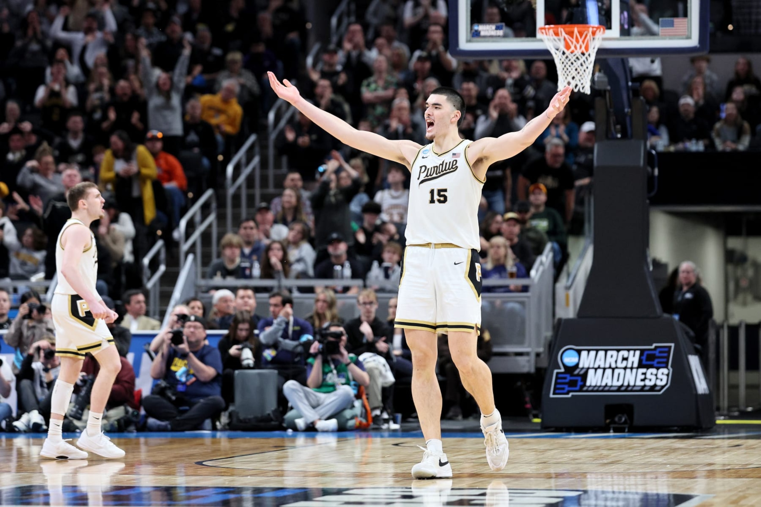 INDIANAPOLIS, INDIANA - MARCH 24: Zach Edey #15 of the Purdue Boilermakers celebrates a basket against the Utah State Aggies during the second half in the second round of the NCAA Men's Basketball Tournament at Gainbridge Fieldhouse on March 24, 2024 in Indianapolis, Indiana. (Photo by Andy Lyons/Getty Images)
