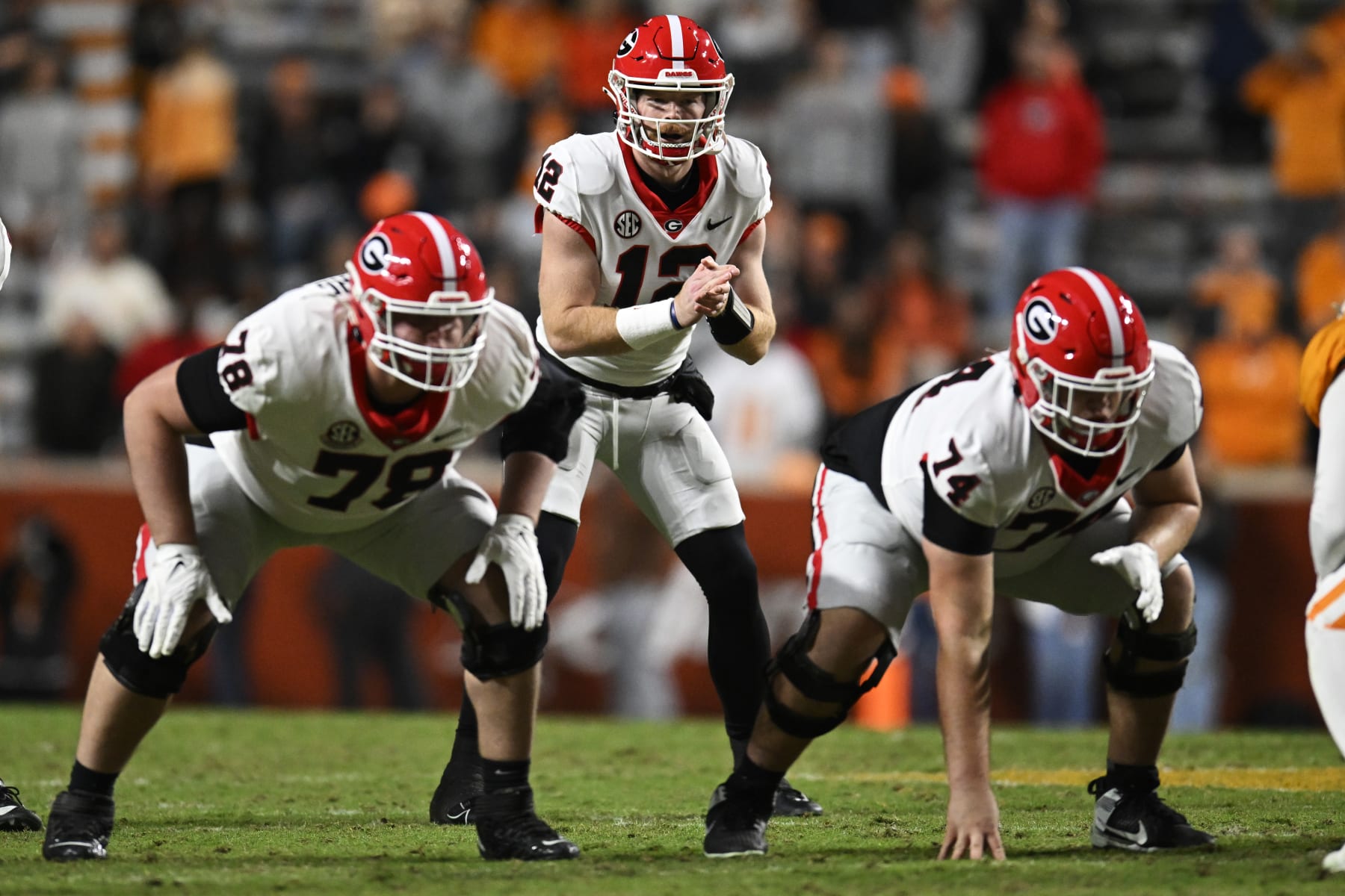 KNOXVILLE, TENNESSEE - NOVEMBER 18: Brock Vandagriff #12 of the Georgia Bulldogs waits for the snap against the Tennessee Volunteers in the fourth quarter at Neyland Stadium on November 18, 2023 in Knoxville, Tennessee. (Photo by Eakin Howard/Getty Images)