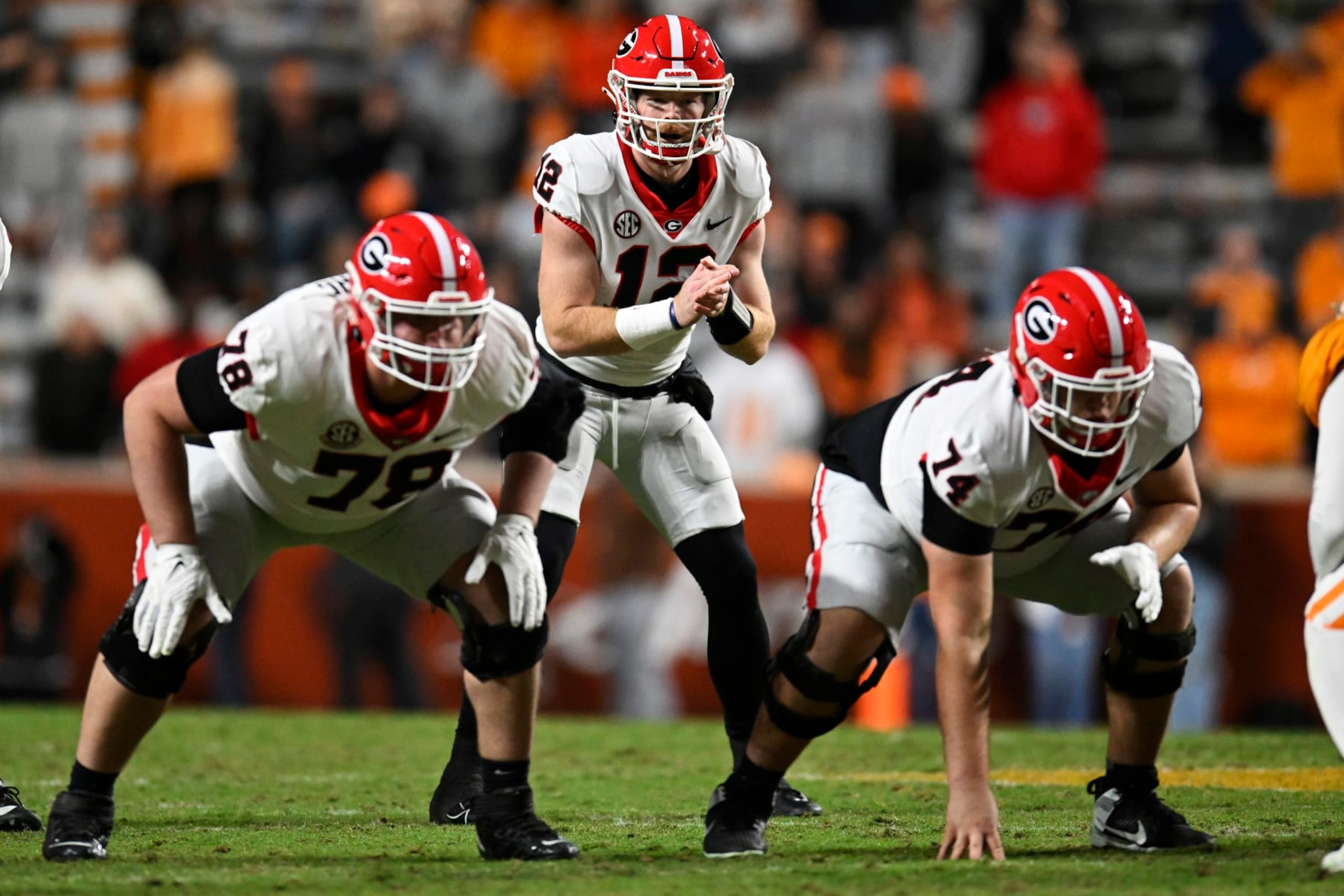 KNOXVILLE, TENNESSEE - NOVEMBER 18: Brock Vandagriff #12 of the Georgia Bulldogs waits for the snap against the Tennessee Volunteers in the fourth quarter at Neyland Stadium on November 18, 2023 in Knoxville, Tennessee. (Photo by Eakin Howard/Getty Images)