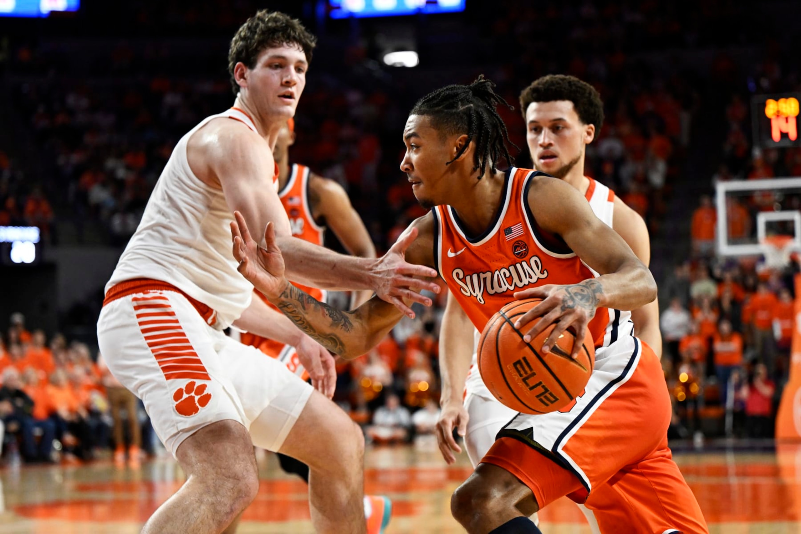 CLEMSON, SOUTH CAROLINA - MARCH 05: Judah Mintz #3 of the Syracuse Orange drives to the basket against PJ Hall #24 of the Clemson Tigers in the first half at Littlejohn Coliseum on March 05, 2024 in Clemson, South Carolina. (Photo by Eakin Howard/Getty Images)