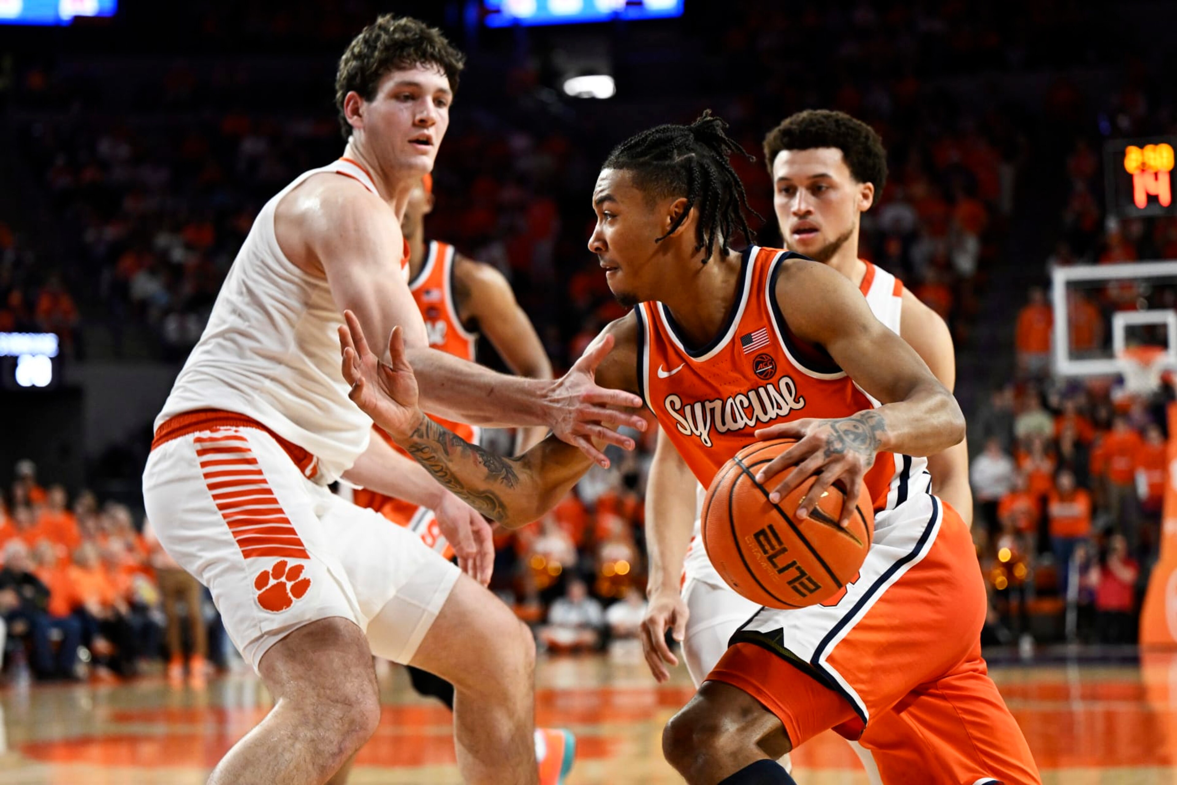 CLEMSON, SOUTH CAROLINA - MARCH 05: Judah Mintz #3 of the Syracuse Orange drives to the basket against PJ Hall #24 of the Clemson Tigers in the first half at Littlejohn Coliseum on March 05, 2024 in Clemson, South Carolina. (Photo by Eakin Howard/Getty Images)