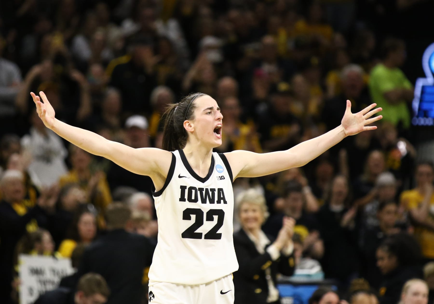 IOWA CITY, IOWA- MARCH 25: Guard Caitlin Clark #22 of the Iowa Hawkeyes celebrates after drawing a foul late in the second half against the West Virginia Mountaineers during their second round match-up in the 2024 NCAA Division 1 Women's Basketball Championship at Carver-Hawkeye Arena on March 25, 2024 in Iowa City, Iowa. (Photo by Matthew Holst/Getty Images)