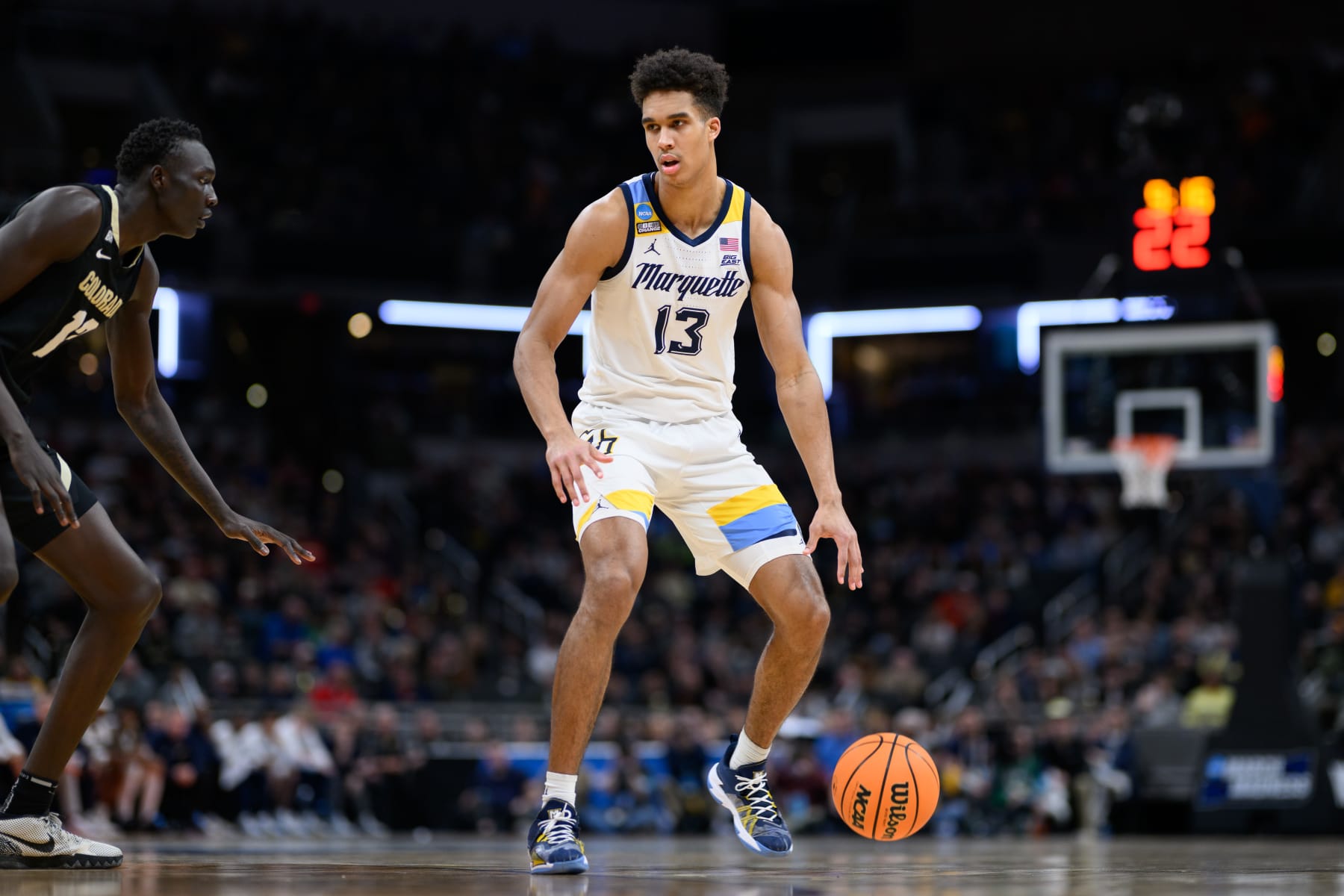 INDIANAPOLIS, IN - MARCH 24: Marquette Golden Eagles forward Oso Ighodaro (13) sets up the offense during the Marquette Golden Eagles versus the Colorado Buffaloes in the second round of the NCAA Division 1 Championship on March 24, 2024, at Gainbridge Fieldhouse in Indianapolis, IN. (Photo by Zach Bolinger/Icon Sportswire via Getty Images)