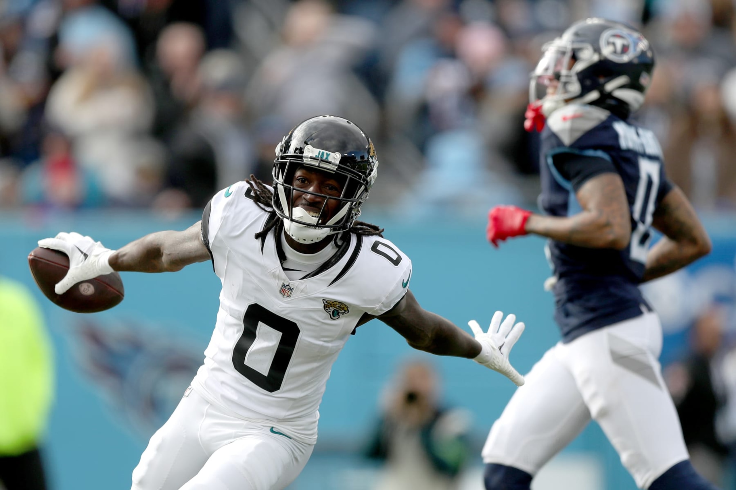 NASHVILLE, TENNESSEE - JANUARY 07: Calvin Ridley #0 of the Jacksonville Jaguars celebrates a touchdown catch during the first half against the Tennessee Titans at Nissan Stadium on January 07, 2024 in Nashville, Tennessee. (Photo by Justin Ford/Getty Images)