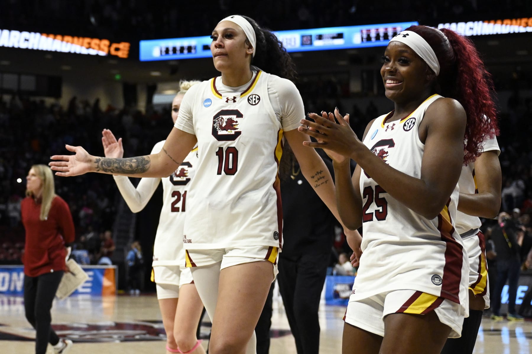 COLUMBIA, SOUTH CAROLINA - MARCH 24: Raven Johnson #25 and Kamilla Cardoso #10 of the South Carolina Gamecocks walk off the court after their win over the North Carolina Tar Heels during the second round of the NCAA Women’s Basketball Tournament at Colonial Life Arena on March 24, 2024 in Columbia, South Carolina. (Photo by Eakin Howard/Getty Images)