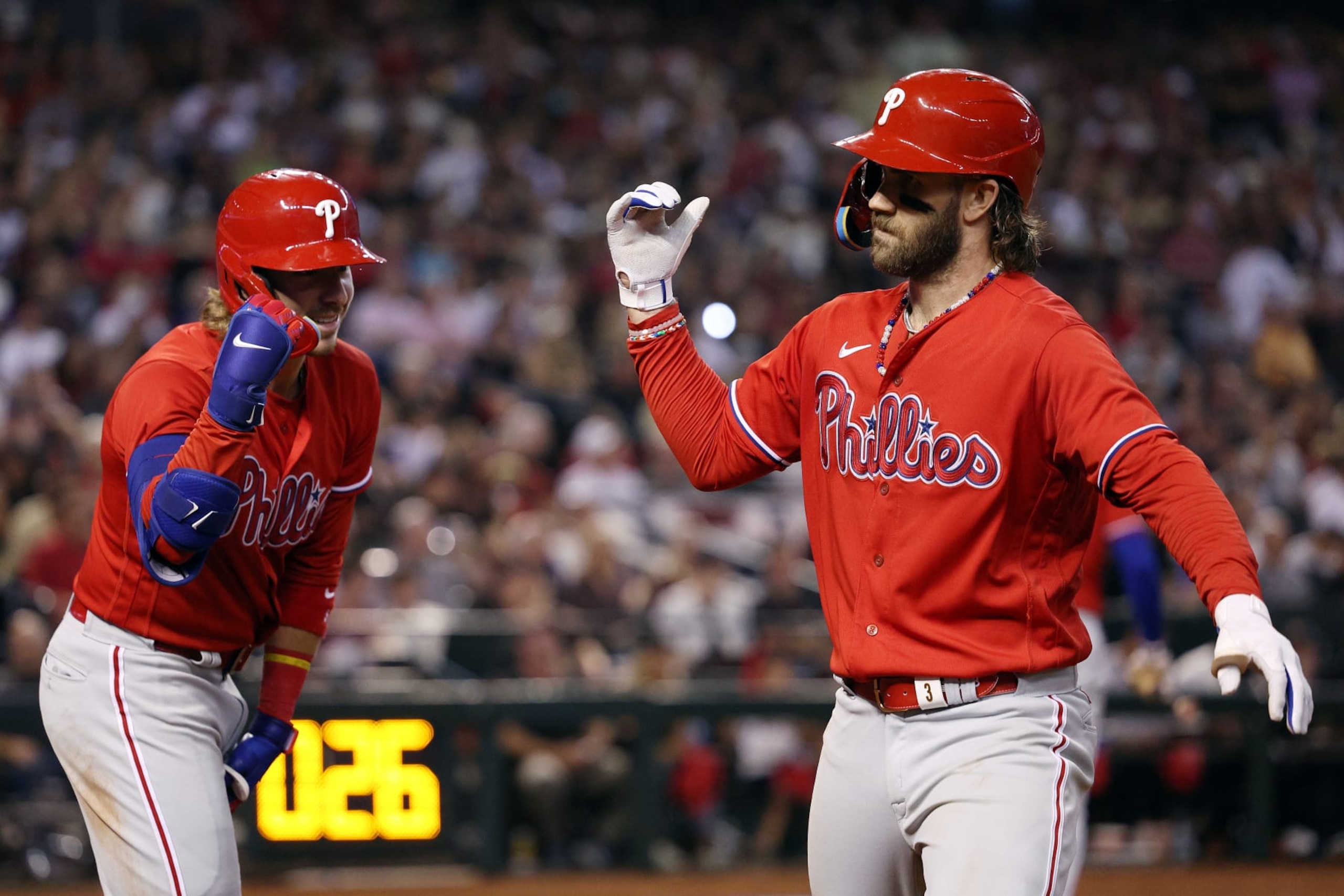 Alec Bohm (L) and Bryce Harper (R)