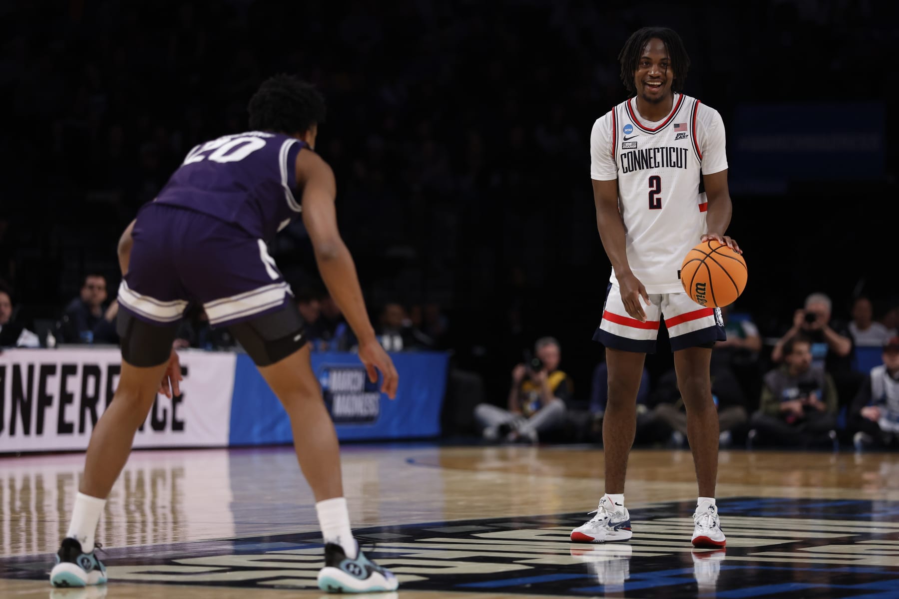 NEW YORK, NEW YORK - MARCH 24: Tristen Newton #2 of the Connecticut Huskies dribbles the ball during the first half against the Northwestern Wildcats in the second round of the NCAA Men's Basketball Tournament at Barclays Center on March 24, 2024 in New York City. (Photo by Sarah Stier/Getty Images)
