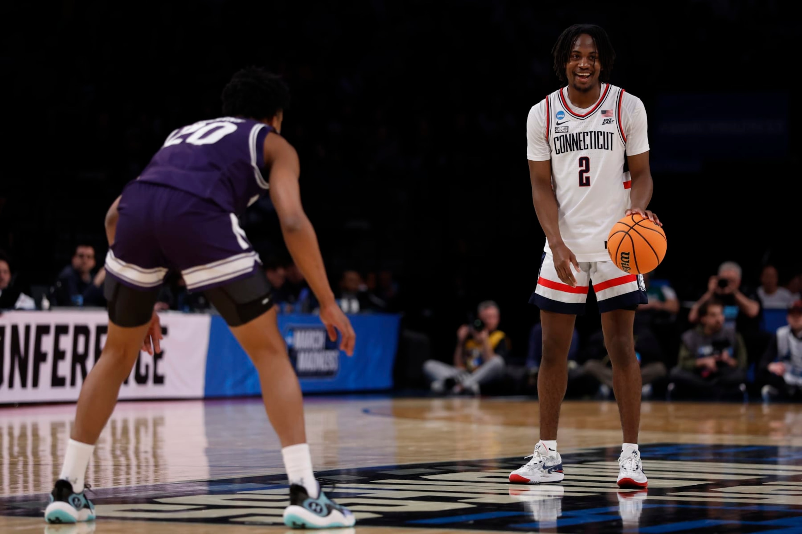 NEW YORK, NEW YORK - MARCH 24: Tristen Newton #2 of the Connecticut Huskies dribbles the ball during the first half against the Northwestern Wildcats in the second round of the NCAA Men's Basketball Tournament at Barclays Center on March 24, 2024 in New York City. (Photo by Sarah Stier/Getty Images)