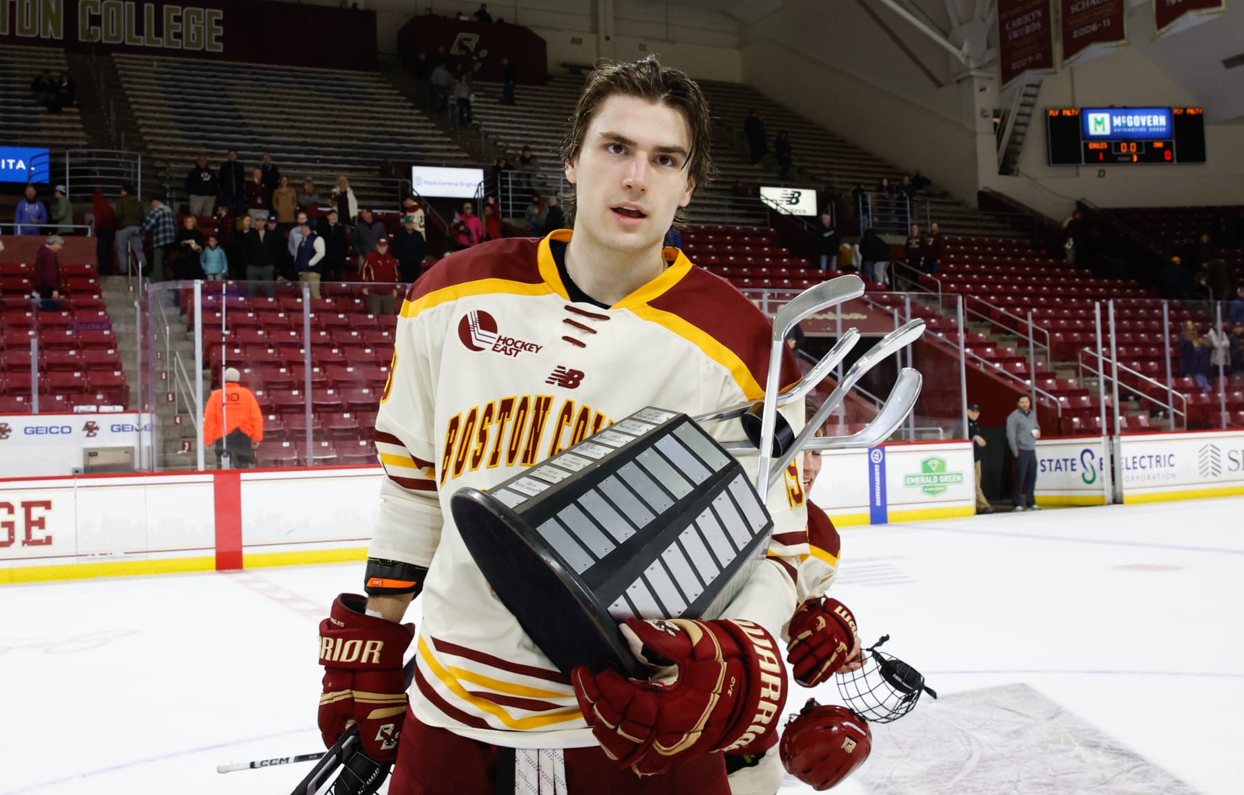 CHESTNUT HILL, MASSACHUSETTS - MARCH 3: Cutter Gauthier #19 of the Boston College Eagles holds the Hockey East regular season championship trophy after an NCAA hockey game against the New Hampshire Wildcats of an NCAA hockey game at Kelley Rink on March 3, 2024 in Chestnut Hill, Massachusetts. The Eagles won 1-0 and clinched the Hockey East regular season championship. (Photo by Richard T Gagnon/Getty Images)