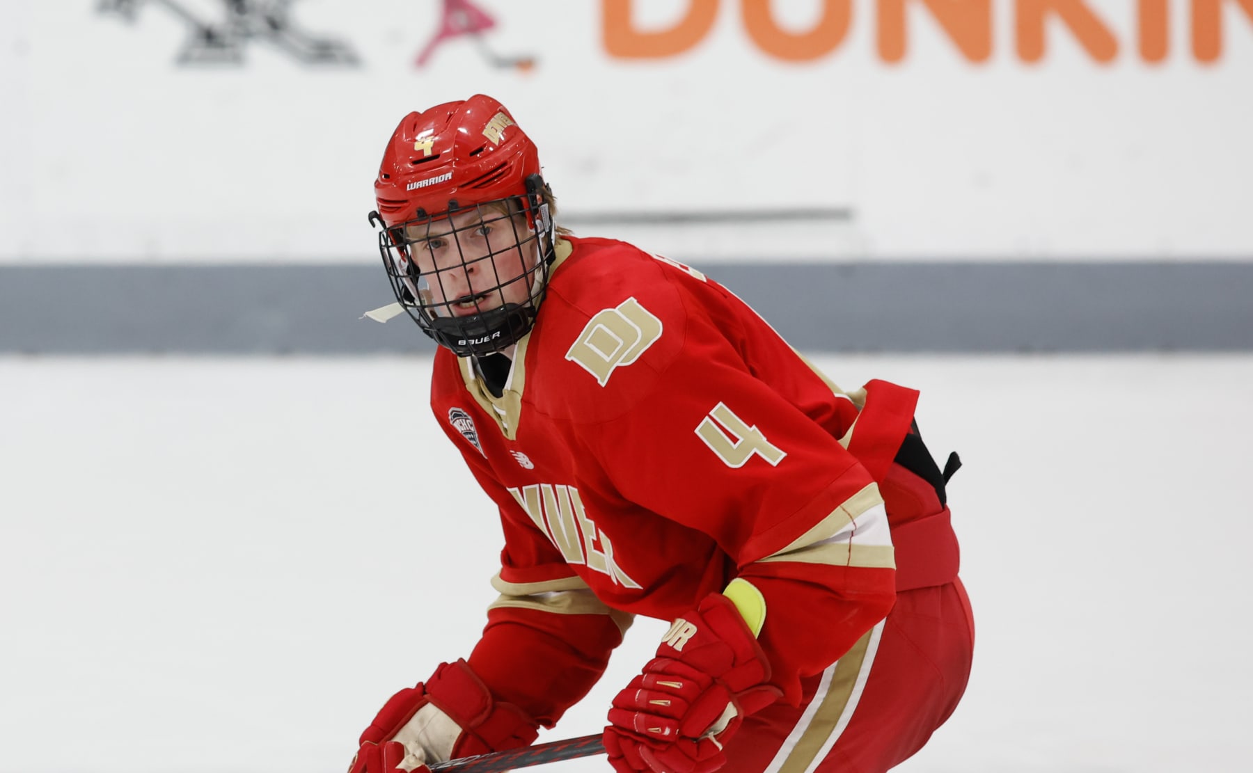 PROVIDENCE, RHODE ISLAND - OCTOBER 20: Jack Devine #4 of the Denver Pioneers skates against the Providence College Friars during NCAA hockey at the Schneider Arena on October 20, 2023 in Providence, Rhode Island. The Friars won 4-3. (Photo by Richard T Gagnon/Getty Images)