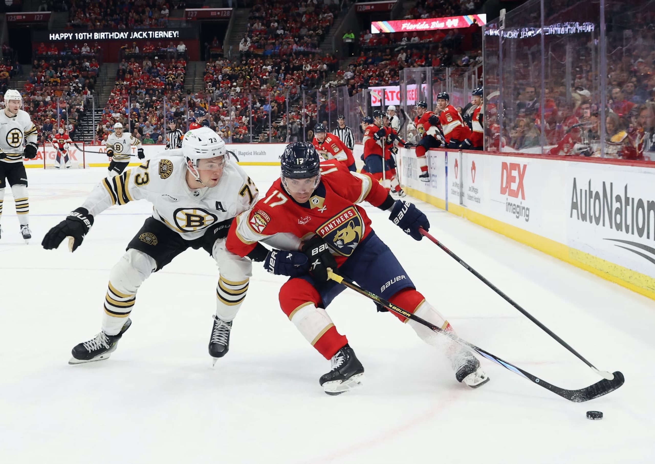 SUNRISE, FLORIDA - MARCH 26: Charlie McAvoy #73 of the Boston Bruins defends against Evan Rodrigues #17 of the Florida Panthers during the second period at Amerant Bank Arena on March 26, 2024 in Sunrise, Florida. (Photo by Bruce Bennett/Getty Images)
